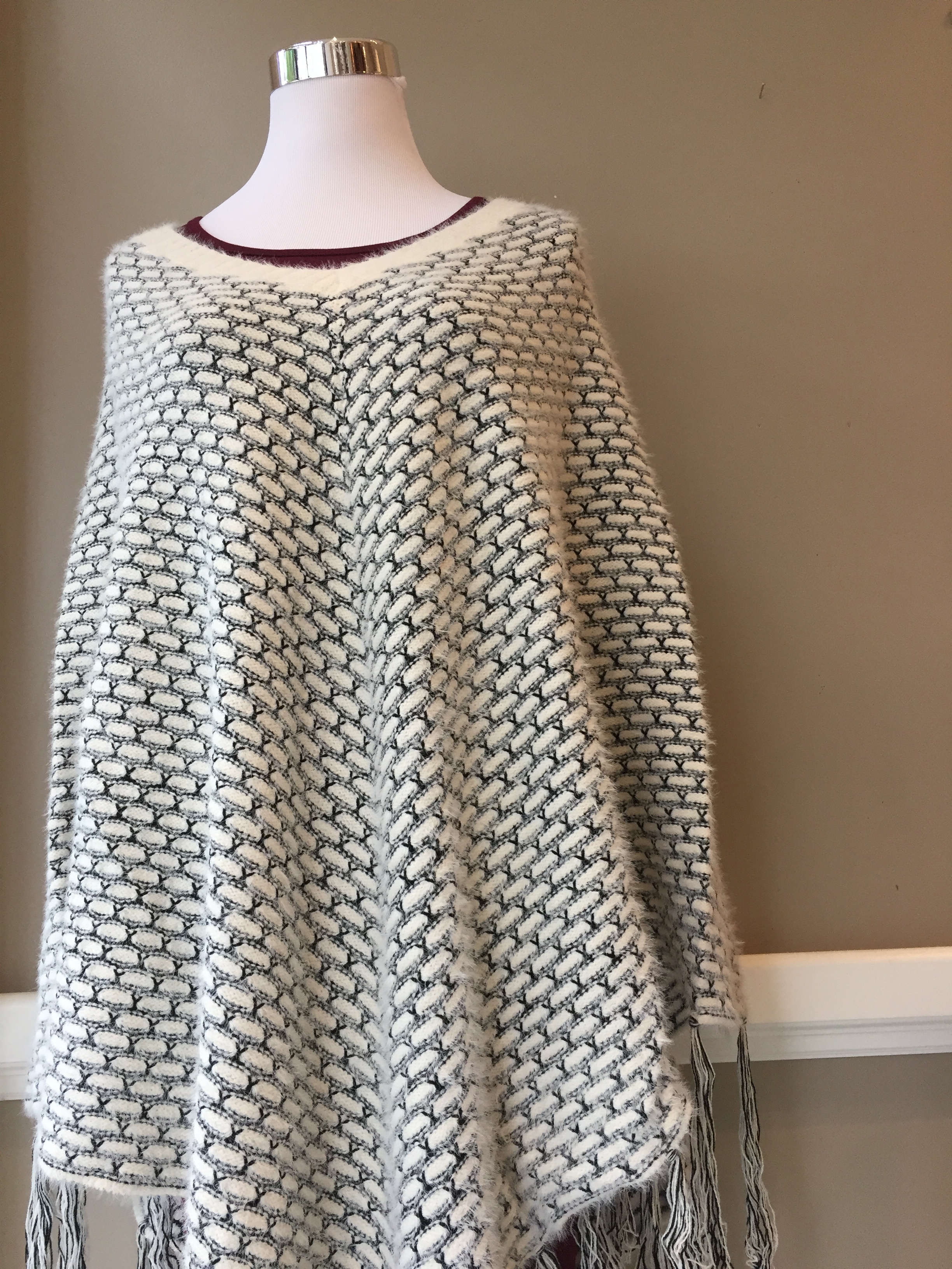 Black and white poncho ($38, also in navy)