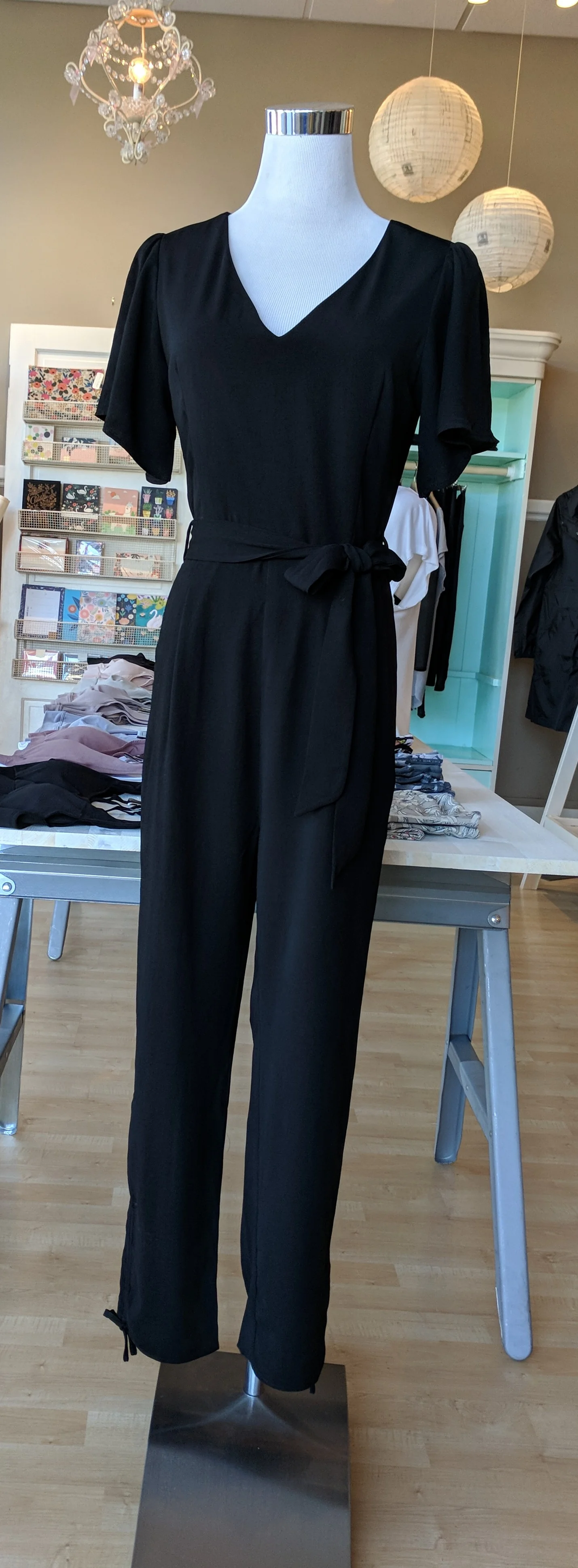 Black v-neck jumpsuit with tie $62