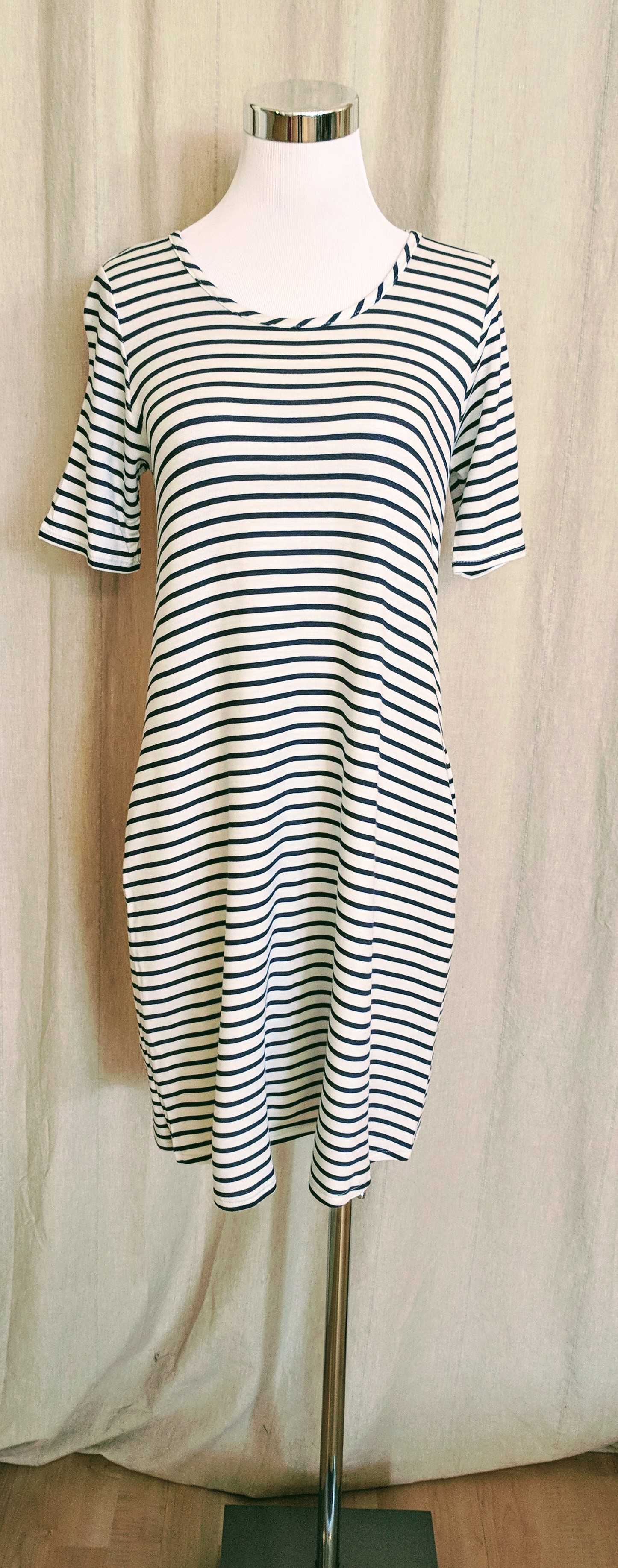 Navy stripe tunic dress with key hole detail on back. $38