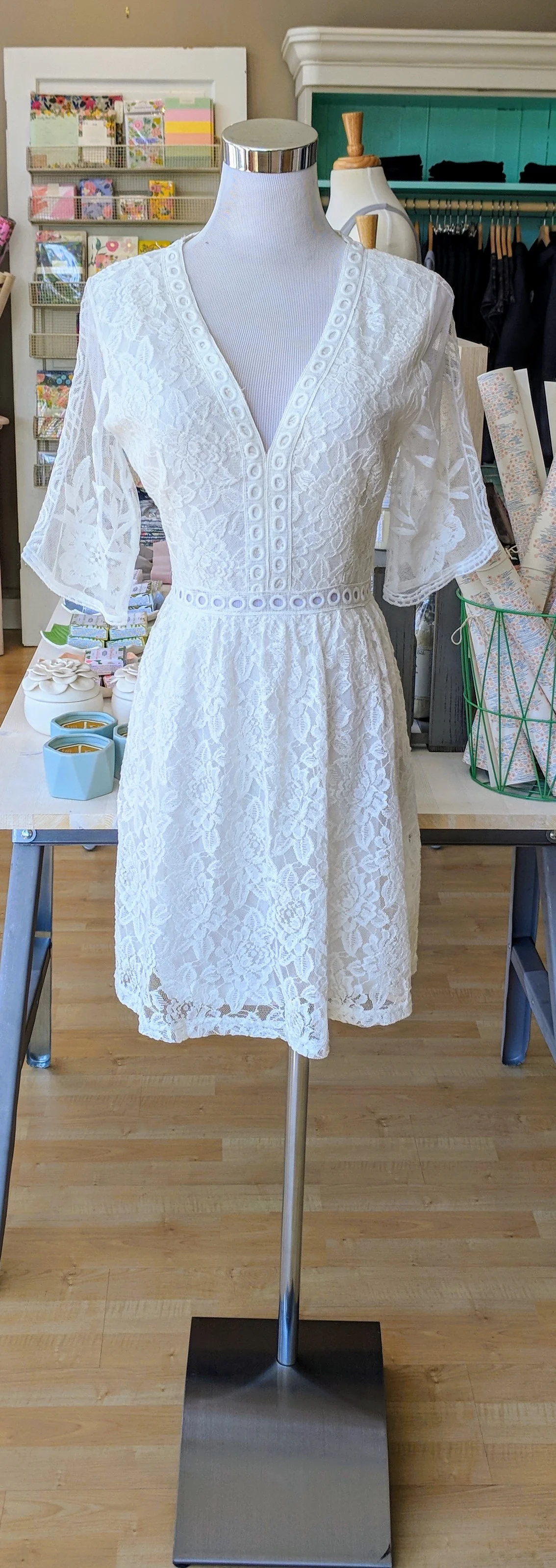 Off White crochet dress with bell sleeves. 