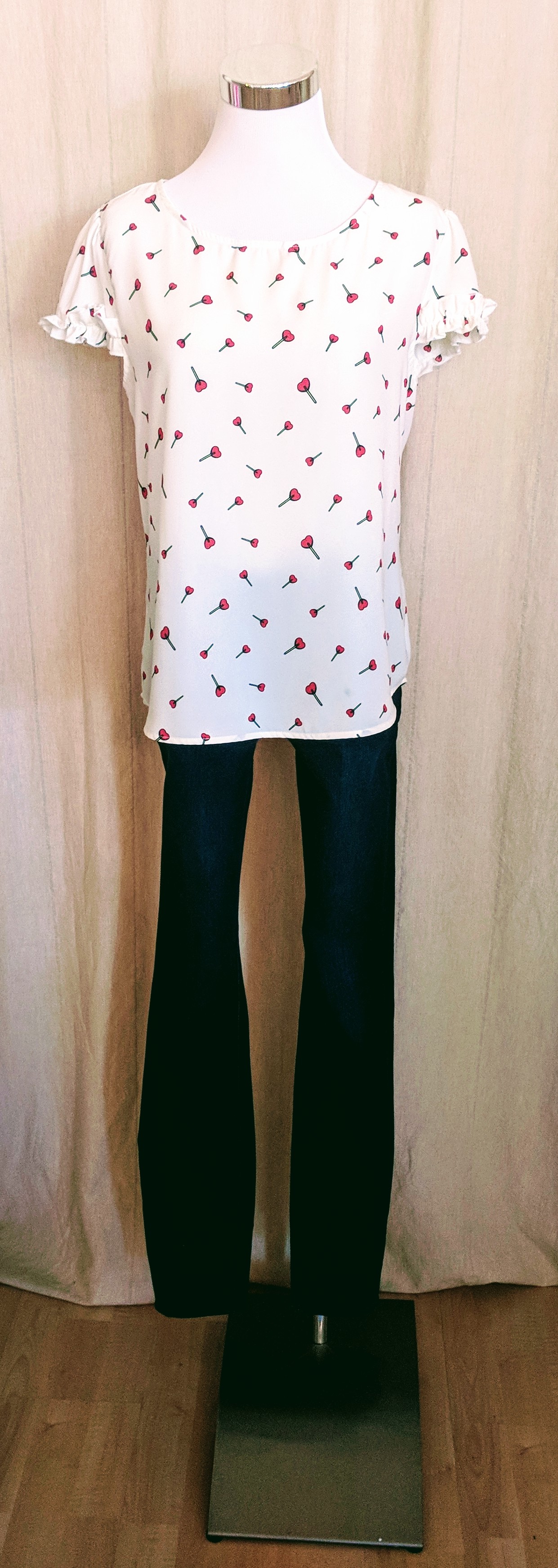 White w/ hearts flutter sleeve top.