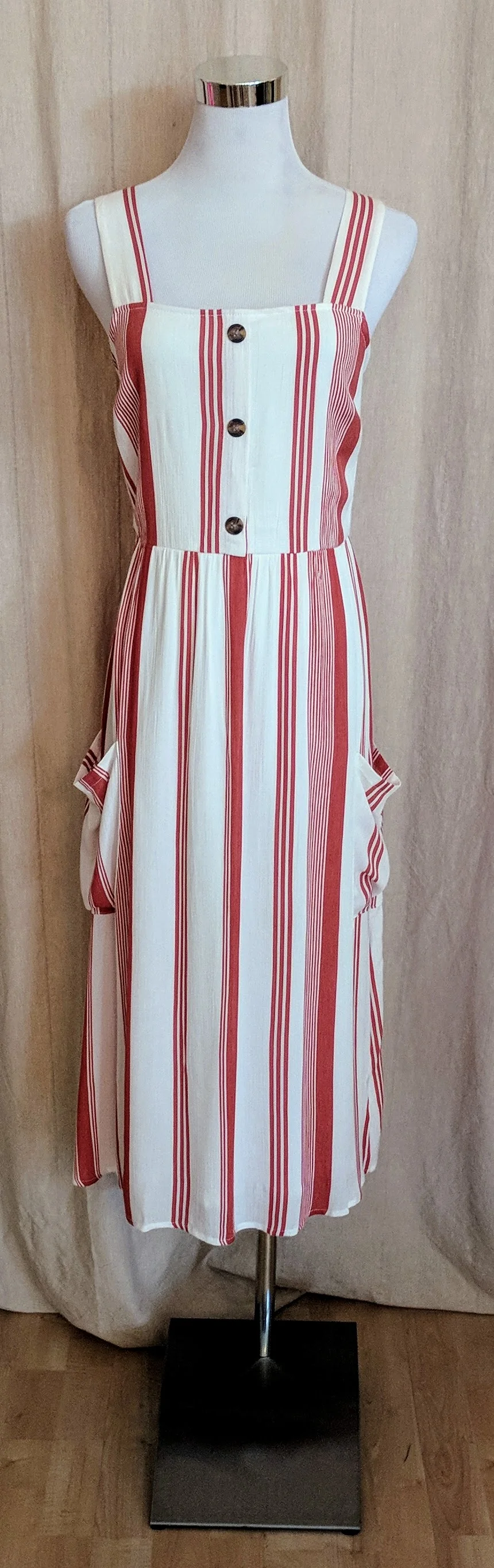White and orange striped midi dress with buttons. 