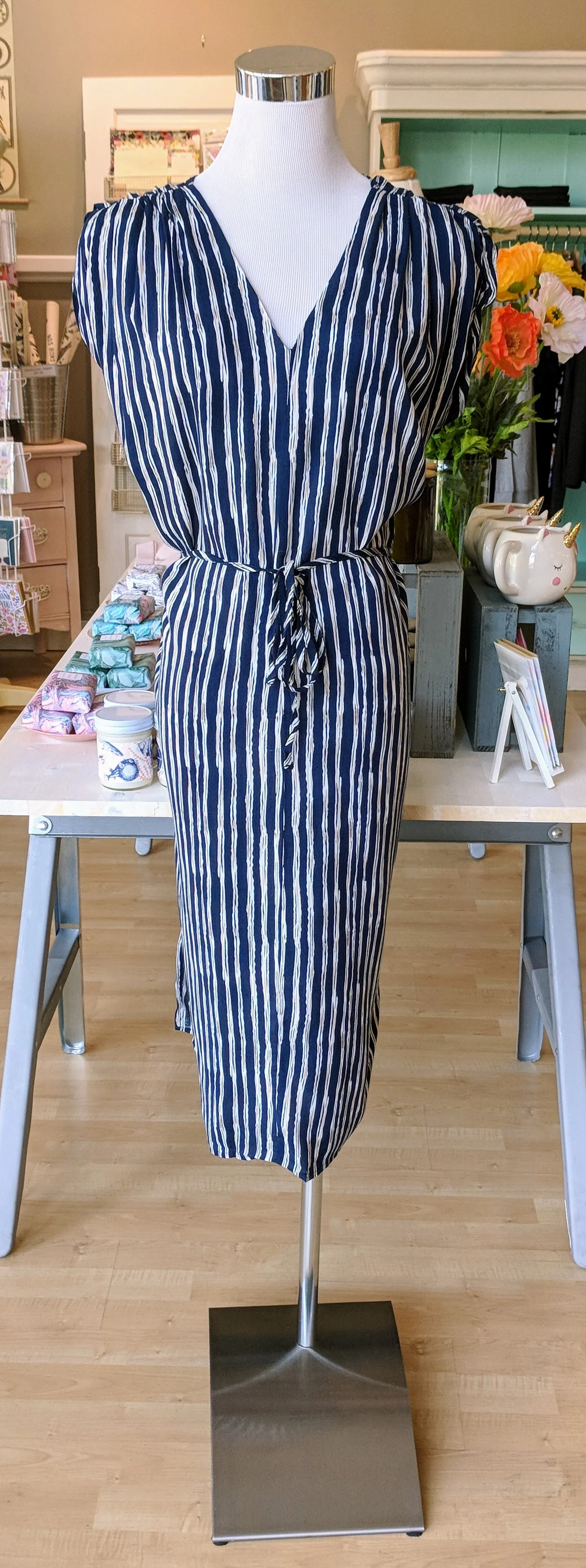 Blue pleated midi dress with tie front. 
