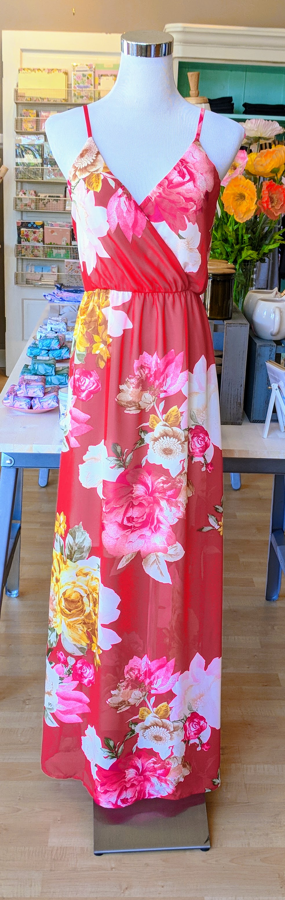 Red floral pattern faux wrap dress.