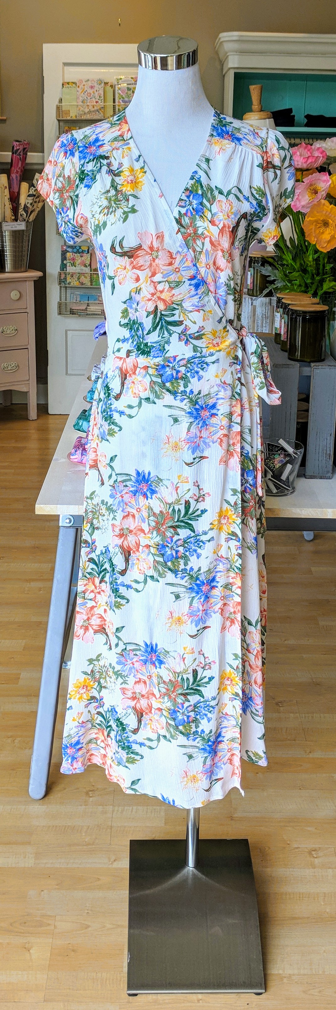 Ivory floral wrap dress with cap sleeve. 