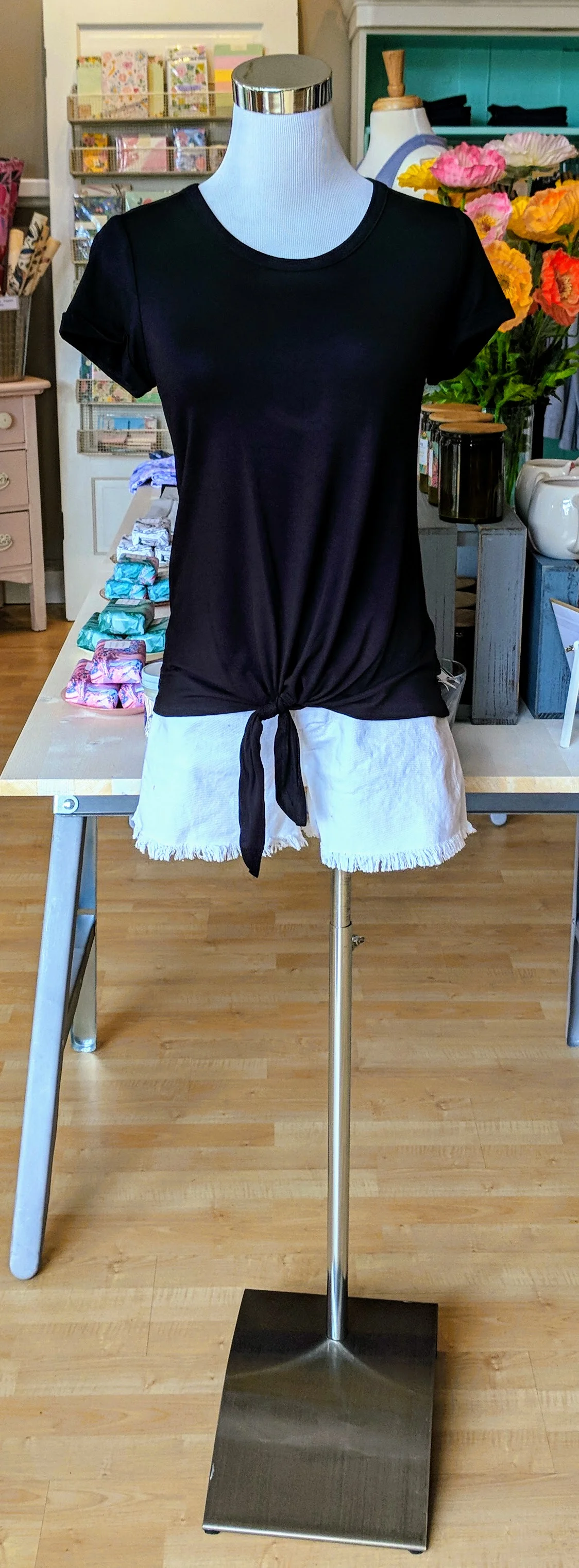 Black tee with key hole tie on front. 