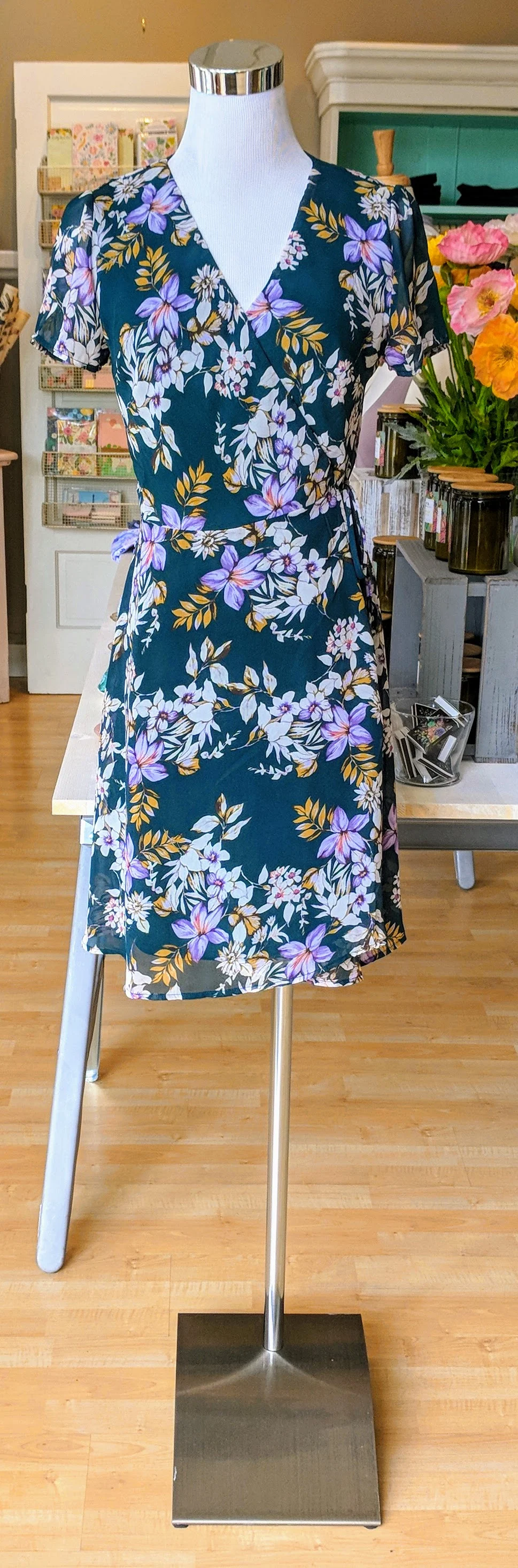 Hunter green floral wrap dress. 