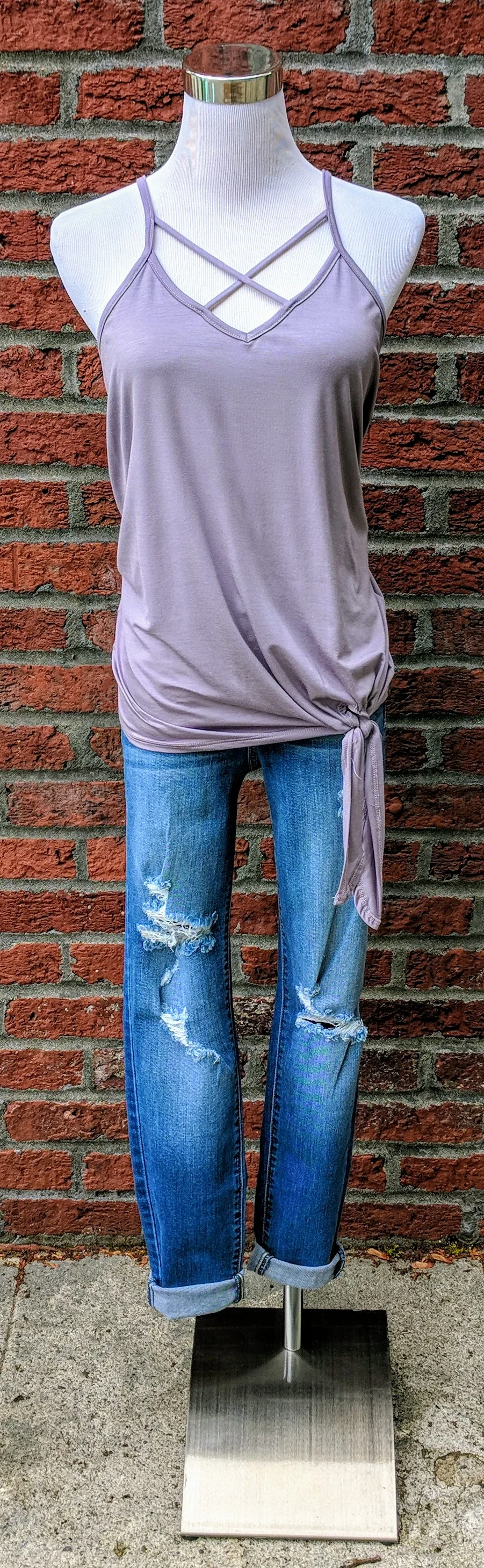 Lavender knit tank with x-strap and knotted hem. 