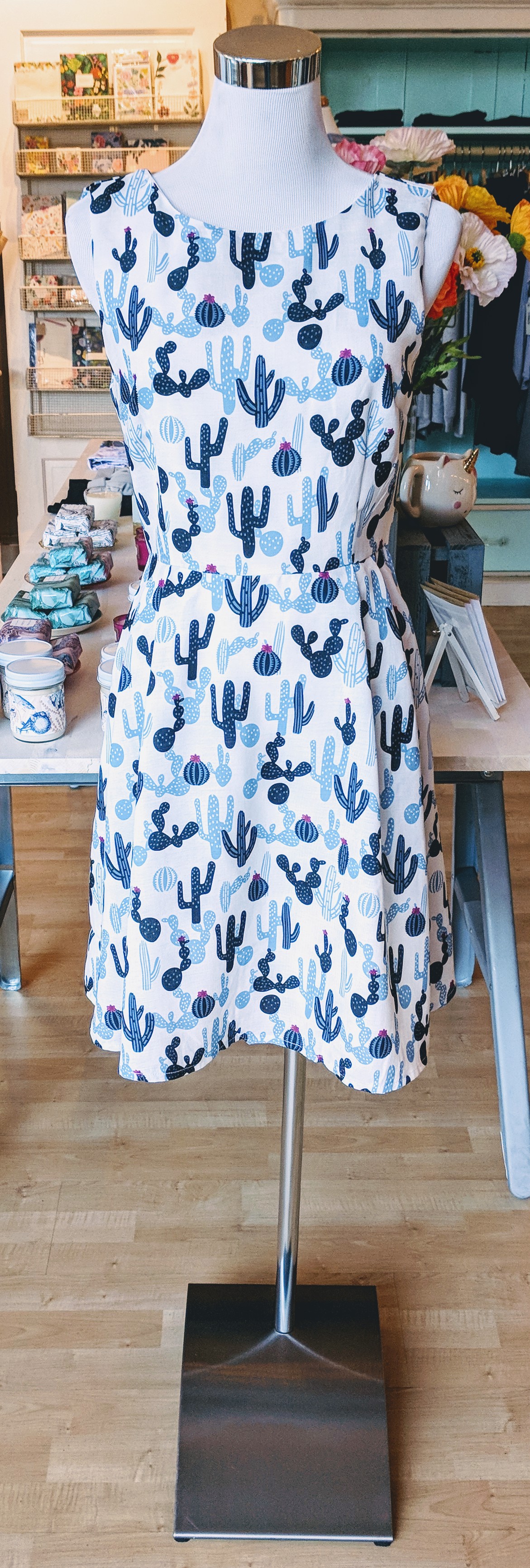 Simple blue cactus print dress with pockets. 