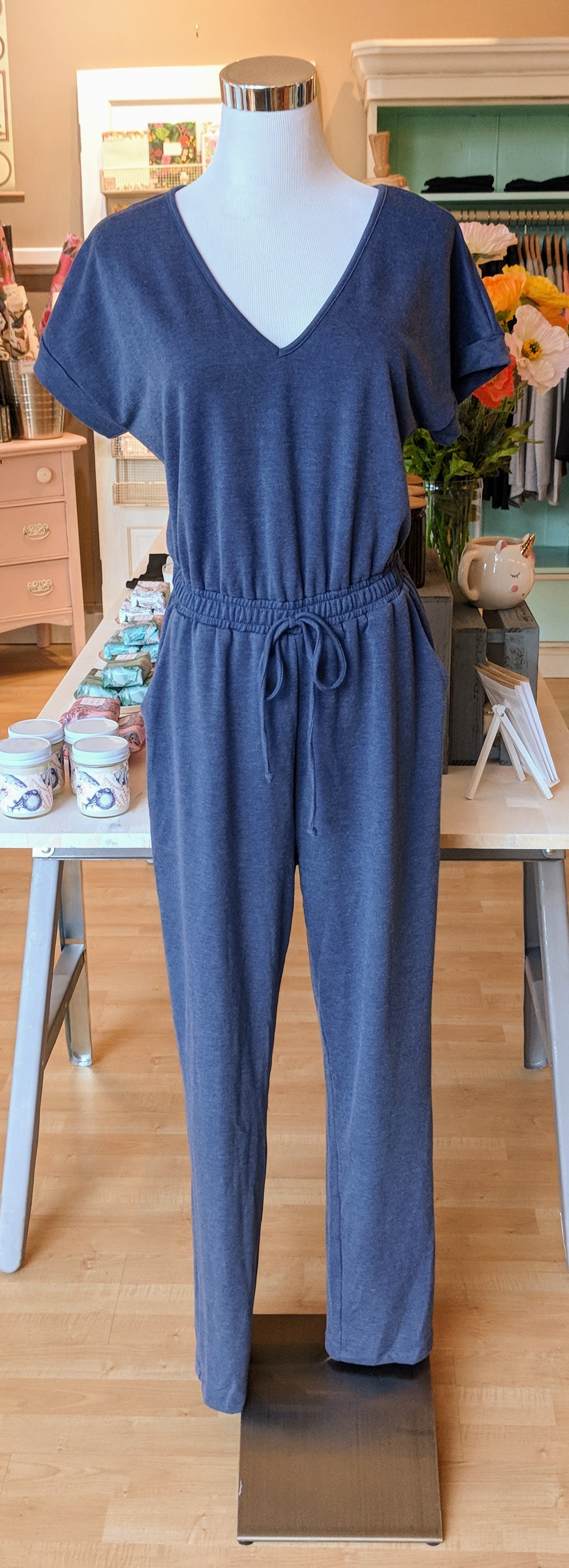 Denim blue jumpsuit with tie waistband 