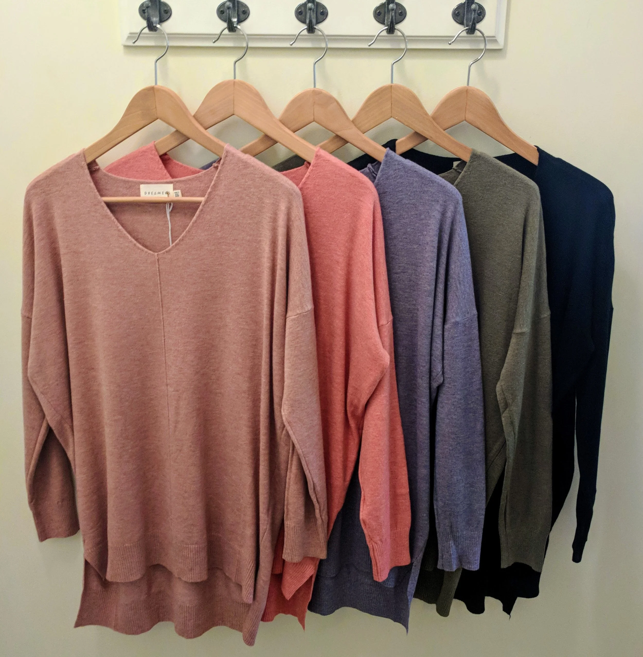 Dusty Rose, Coral, Dusty Blue, Olive, and Black dreamer sweater. 