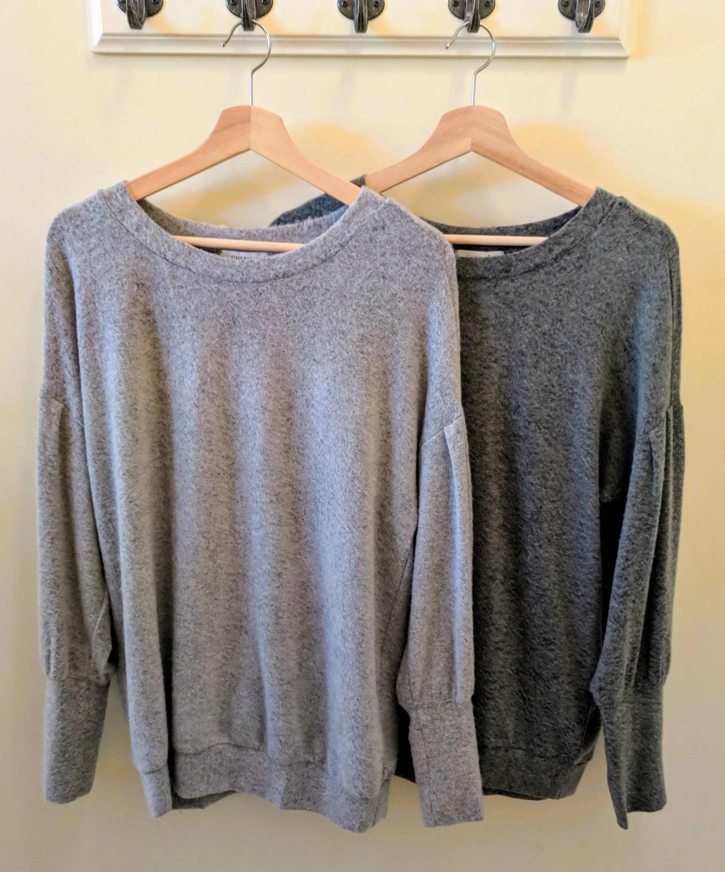Heather Grey and Olive sweater with balloon sleeve and round neck. 