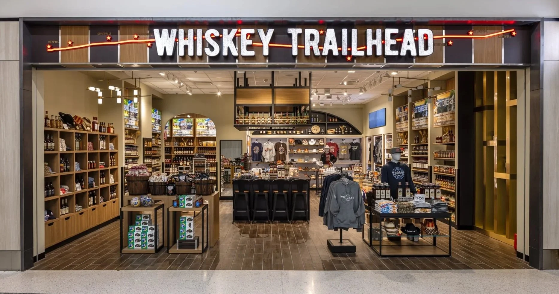 Whiskey Trailhead at BNA Airport - Fixture design, space planning, in-store marketing, visual and propping.