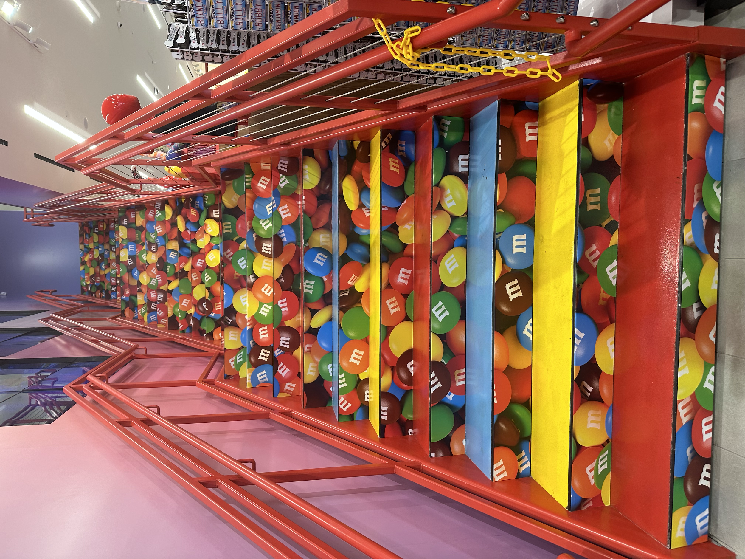 In one location, the candy department was on the second level. I created a playful entry using M&M stair graphics that led customers up to the space.