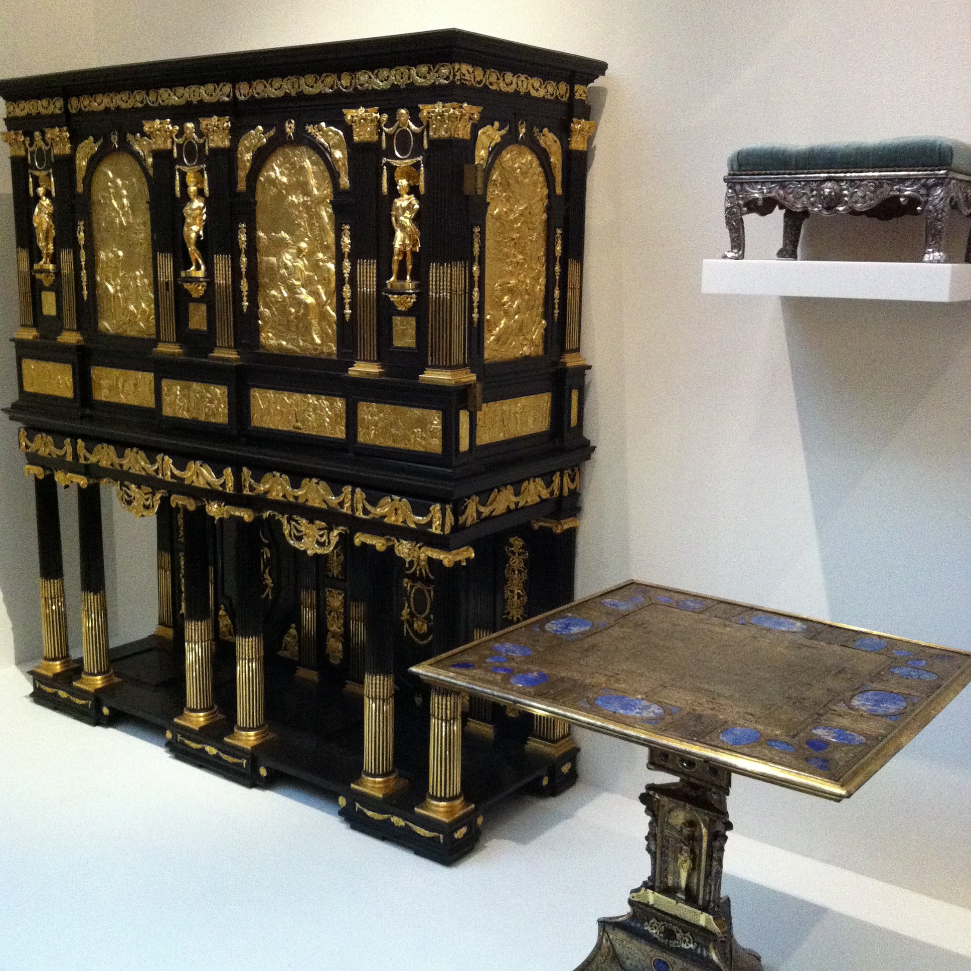 17th Century Parisian 'Marie de Medici' cabinet with ebony veneer and gilded brass plaques depicting scenes from a romantic poem