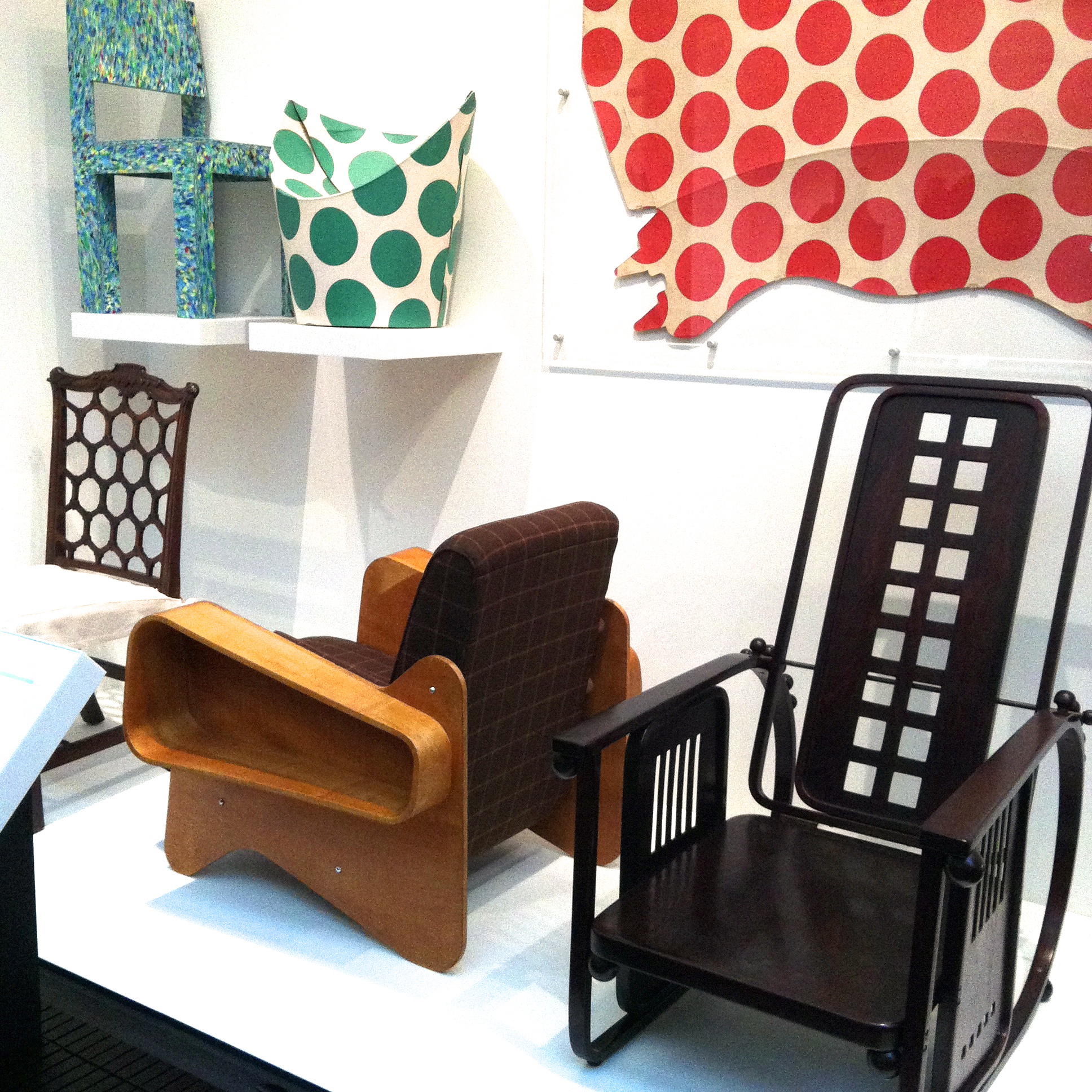 Plywood armchairs by Marcel Breuer (1936, left) and Josef Hoffmann (1908, right), with the spotted 'Child Chair' made from flat-packed cardboard