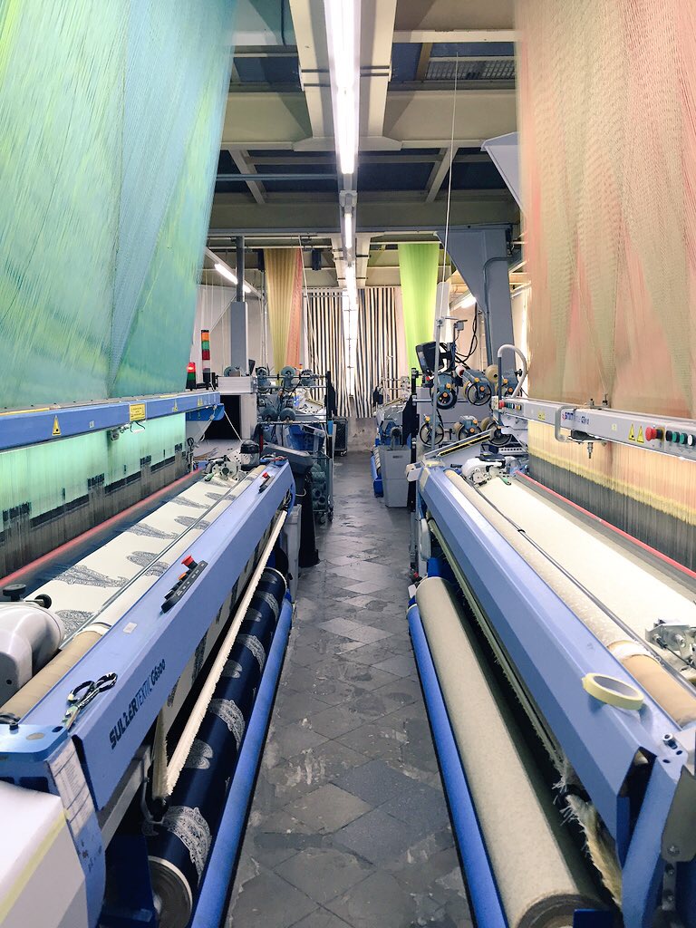 The large and loud jacquard machines.