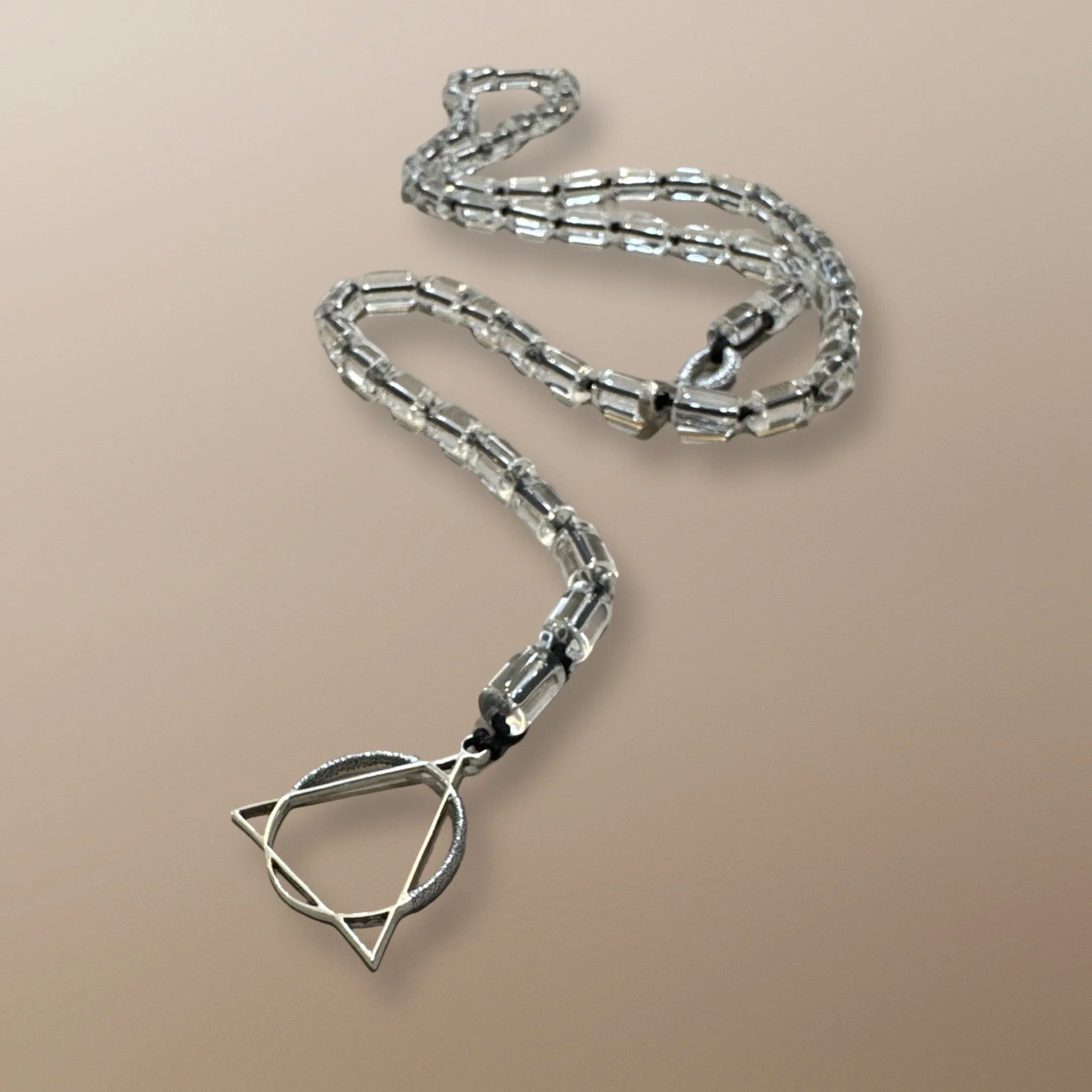 NANDA110	12MM X 6MM QUARTZ CYLINDERS WITH 30MM STERLING SILVER LOGO CHARM AND STERLING SILVER SIGNATURE CLASP 36” 3.JPG