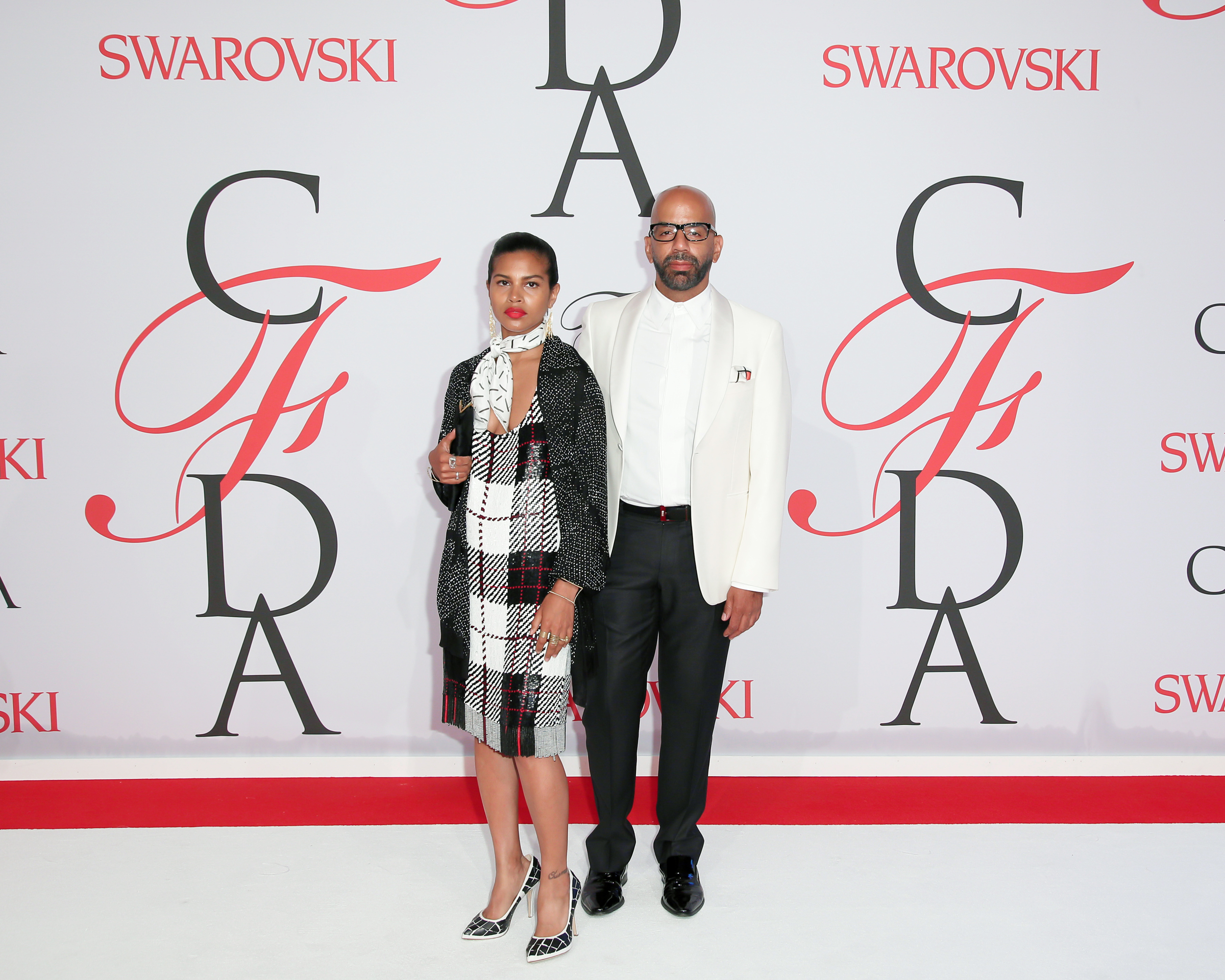 Mengly Hernandez and Simon Alcantara CFDA Awards 2015. Mengly wearing Simon Alcantara Gold Fringe Earrings and hand woven cuffs, and Linea Germania scarves Photo by: Matteo Prandoni BFA