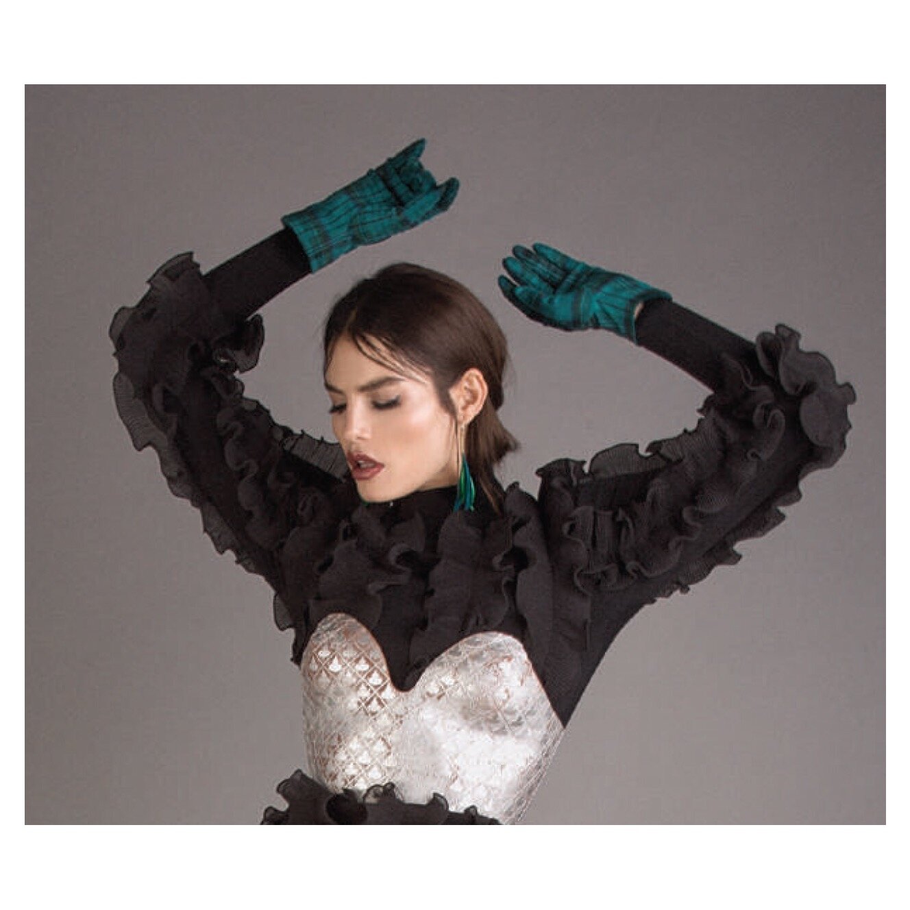 SIMON ALCANTARA FEATHER EARRINGS CP.jpeg