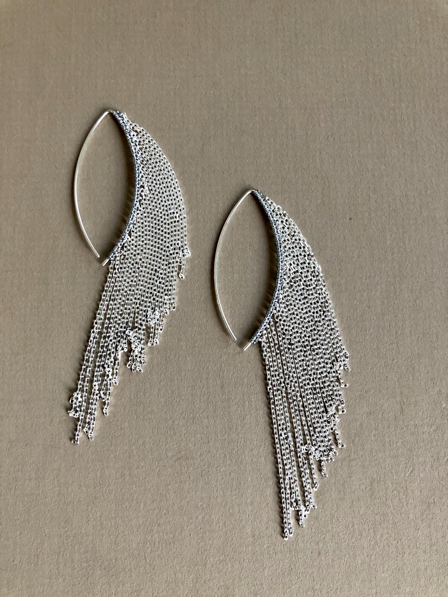 AQE112 LARGE STERLING SILVER HAND WOVEN SHINY SILVER HOOPS. AVAILABLE IN  75MM, 60MM, 50MM, AND 40MM SIZES — SIMON ALCANTARA LLC