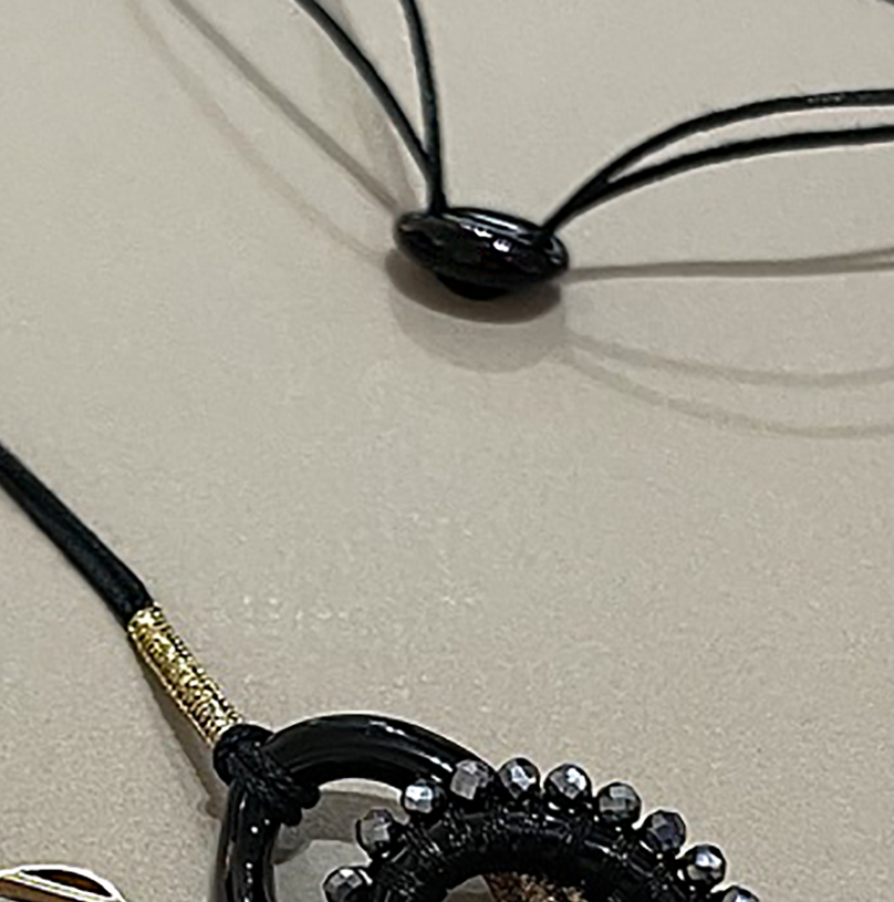 NDL103YG NECKLACE WITH BLACK AGATE CHAIN LINKS HAND WOVEN WITH GOLD AND  METALLIC BLACK CORD, AND TERAHERTZ, AND 15MM 14KT YELLOW GOLD LOGO CHARM,  BLACK AGATE SLIDE. — SIMON ALCANTARA LLC
