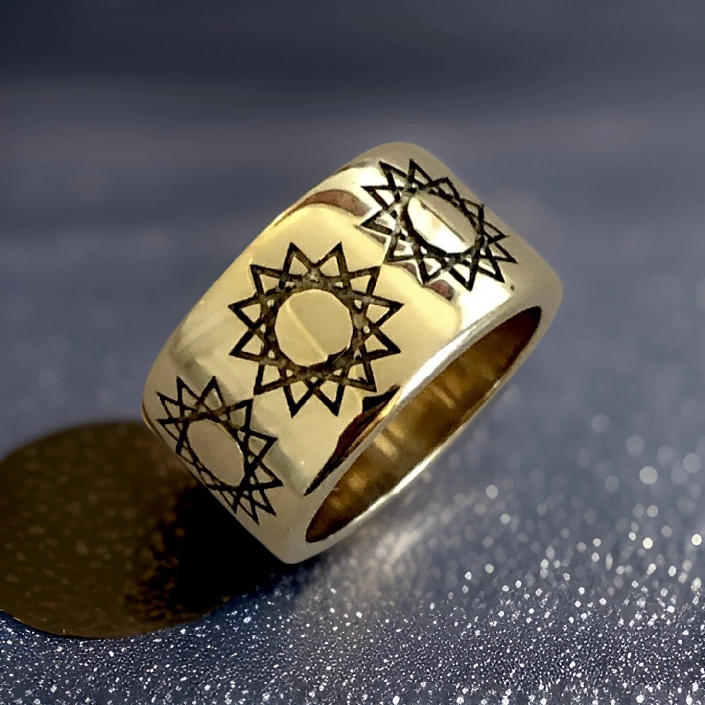 RSTAR12MMYG 14MM YELLOW GOLD BAND WITH TWELVE POINTED STAR 