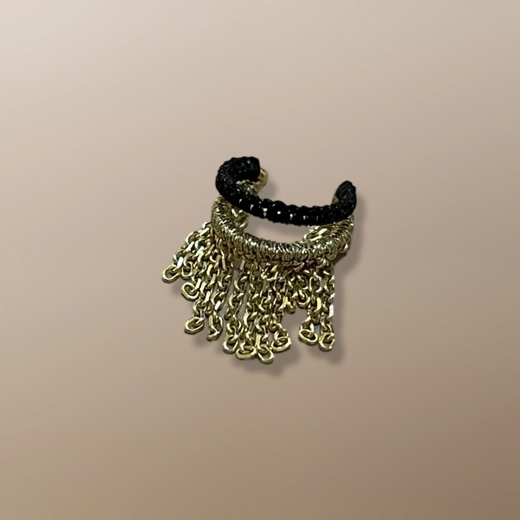 ECLR101 14KT YELLOW GOLD OPEN SPACE EAR CUFF HAND WOVEN WITH HALF INCH CHAIN FRINGE WITH BLACK AND GOLD CORD.