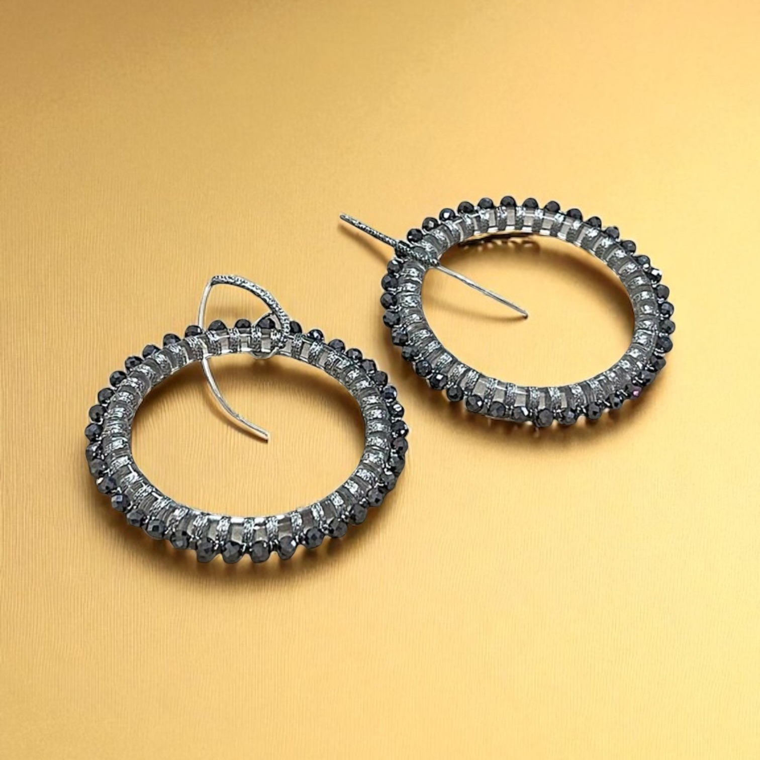 EDL115+45MM+QUARTZ+HOOPS+HAND+WOVEN+WITH+TERAHERTZ%2C+AND+SHINY+SILVER+CORD.+AD+1.png