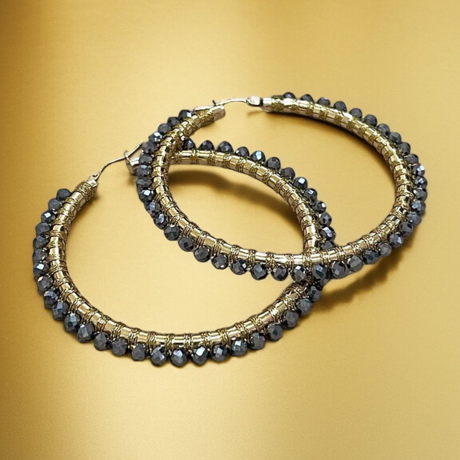 EDL100YG+14KT+YELLOW+GOLD+HOOPS+HAND+WOVEN+WITH+TERAHERTZ+AD+1.png