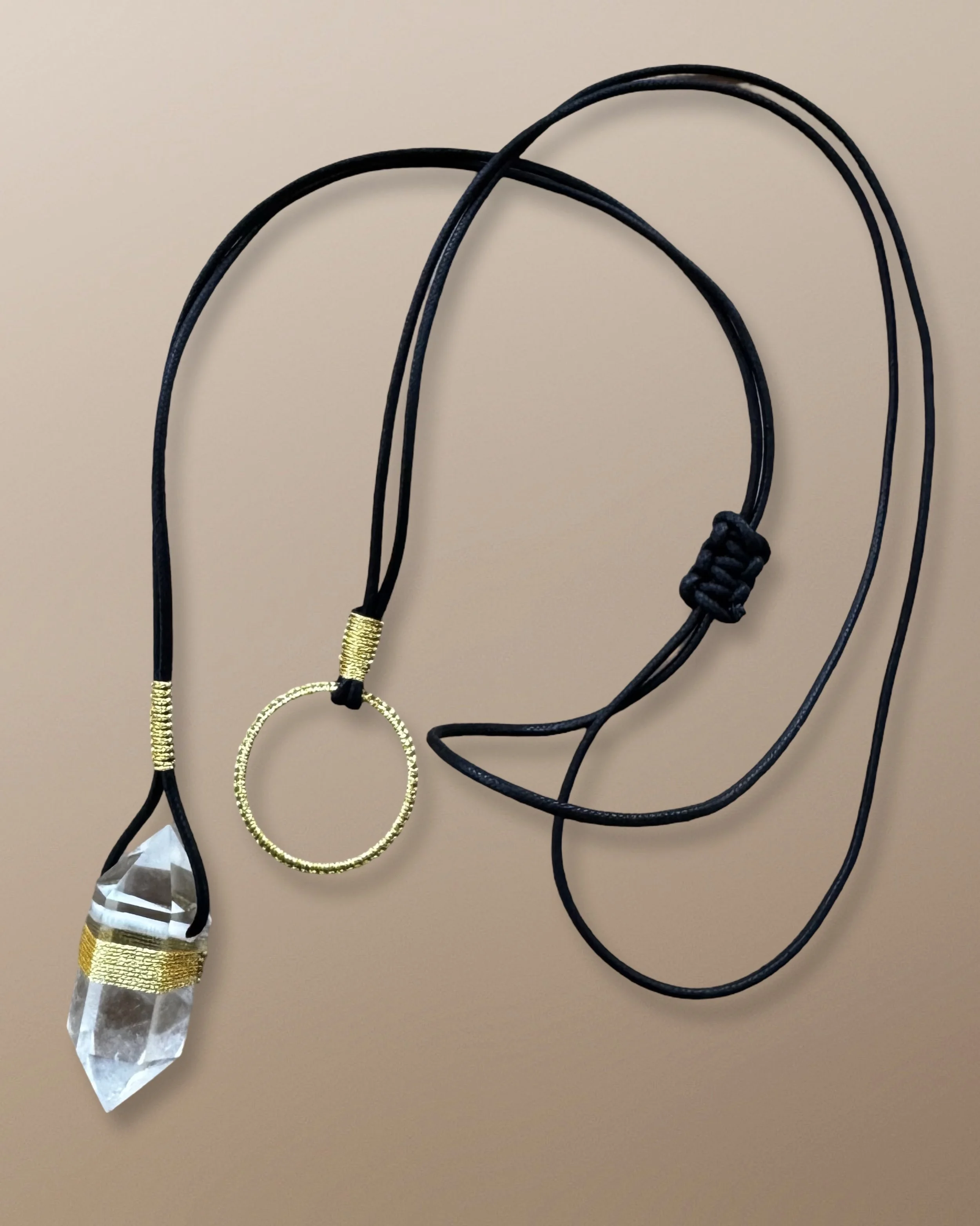 Axis of Light An alignment of clarity and radiance, where crystal and gold converge in celestial alignment.