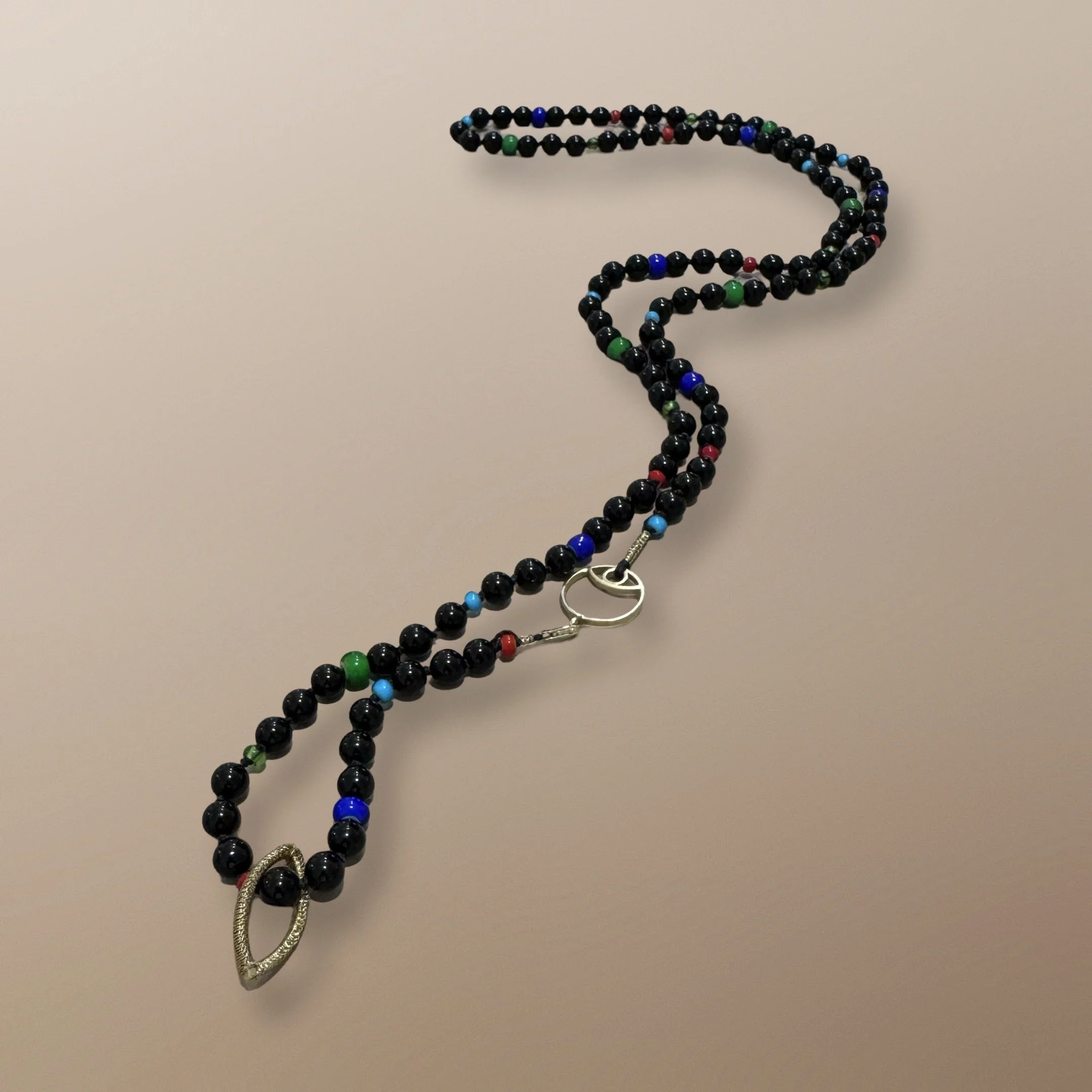 NANDA106 6MM BLACK AGATE SMOOTH BEADS, WITH WHITE HEART AFRICAN TRADE BEADS IN BLUE, GREEN, RED , 14K 15MM CIRCLE EYE CLASP AND VESCIA PICSIS HANDWOVEN CHARM 32”