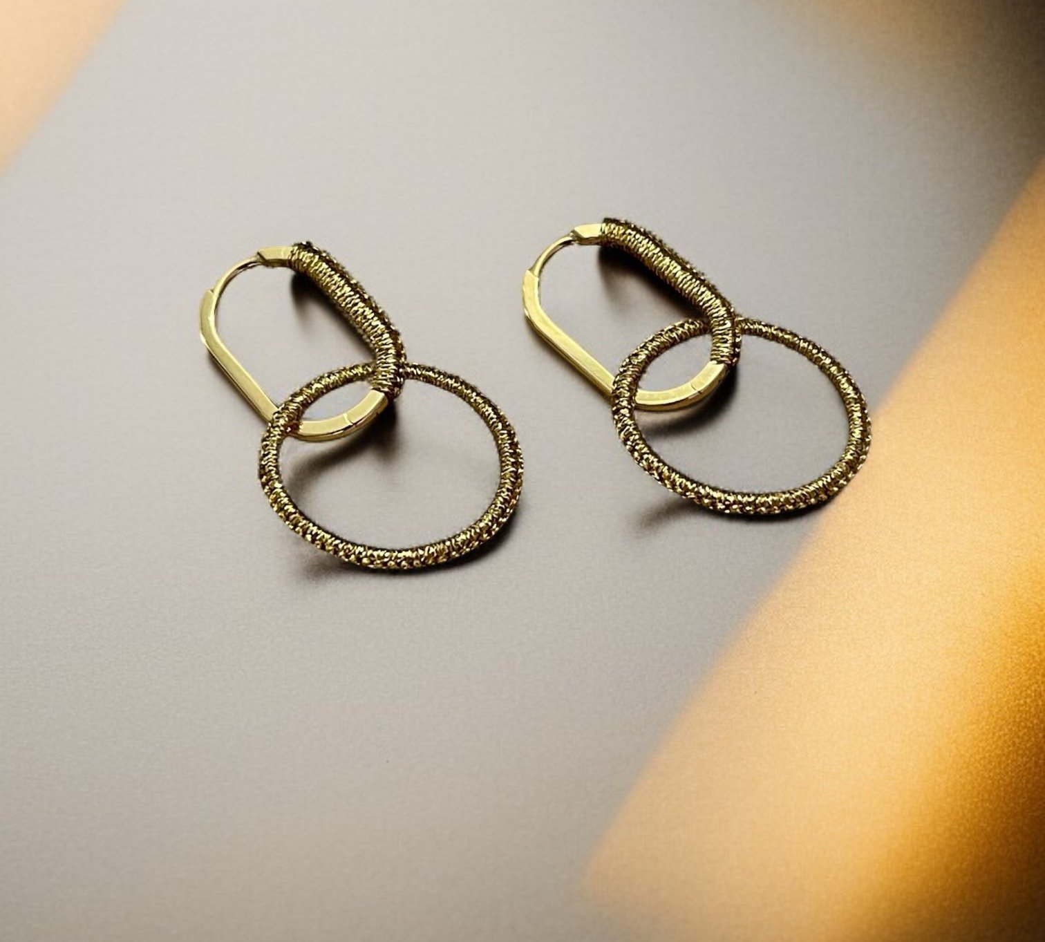 EBG101+14KT+20MM+OVAL+HOOPS+HAND+WOVEN+WITH+GOLD+CORD%2C+WITH+HAND+WOVEN+14KT++17.4MM+CIRCLE+CHARMS+AD.png