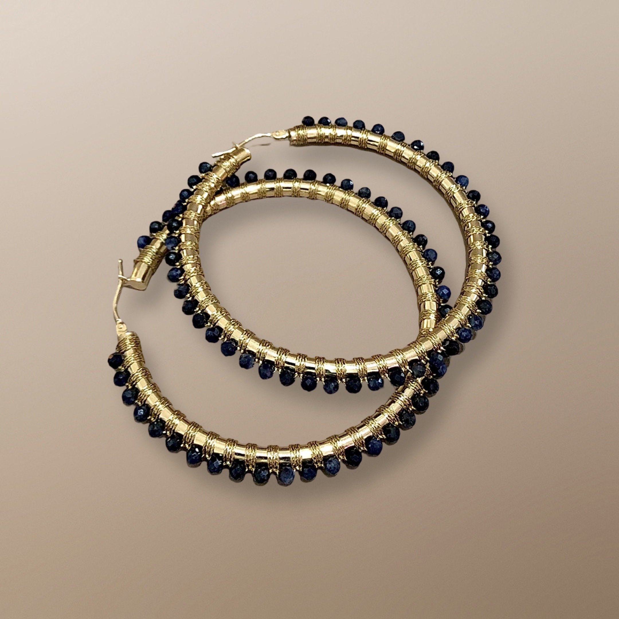 ENG101YG 14KT YELLOW GOLD HOOP HAND WOVEN WITH SAPPHIRE