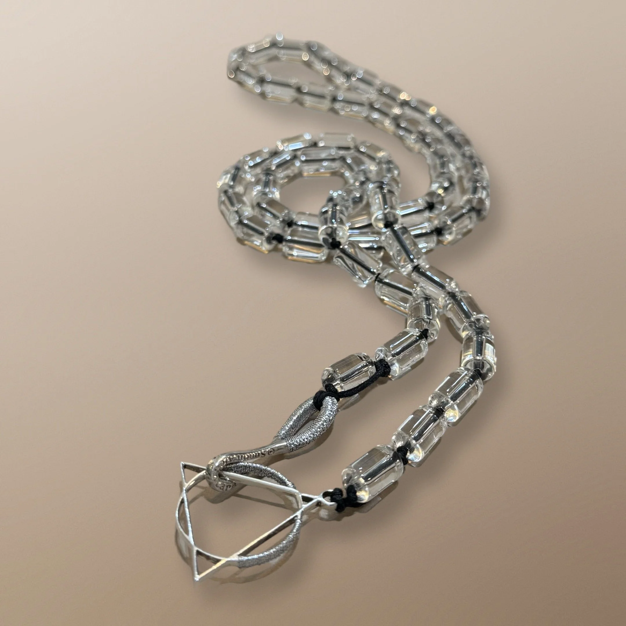 NANDA110 12MM X 6MM QUARTZ CYLINDERS WITH 30MM STERLING SILVER LOGO CHARM AND STERLING SILVER SIGNATURE CLASP 36”