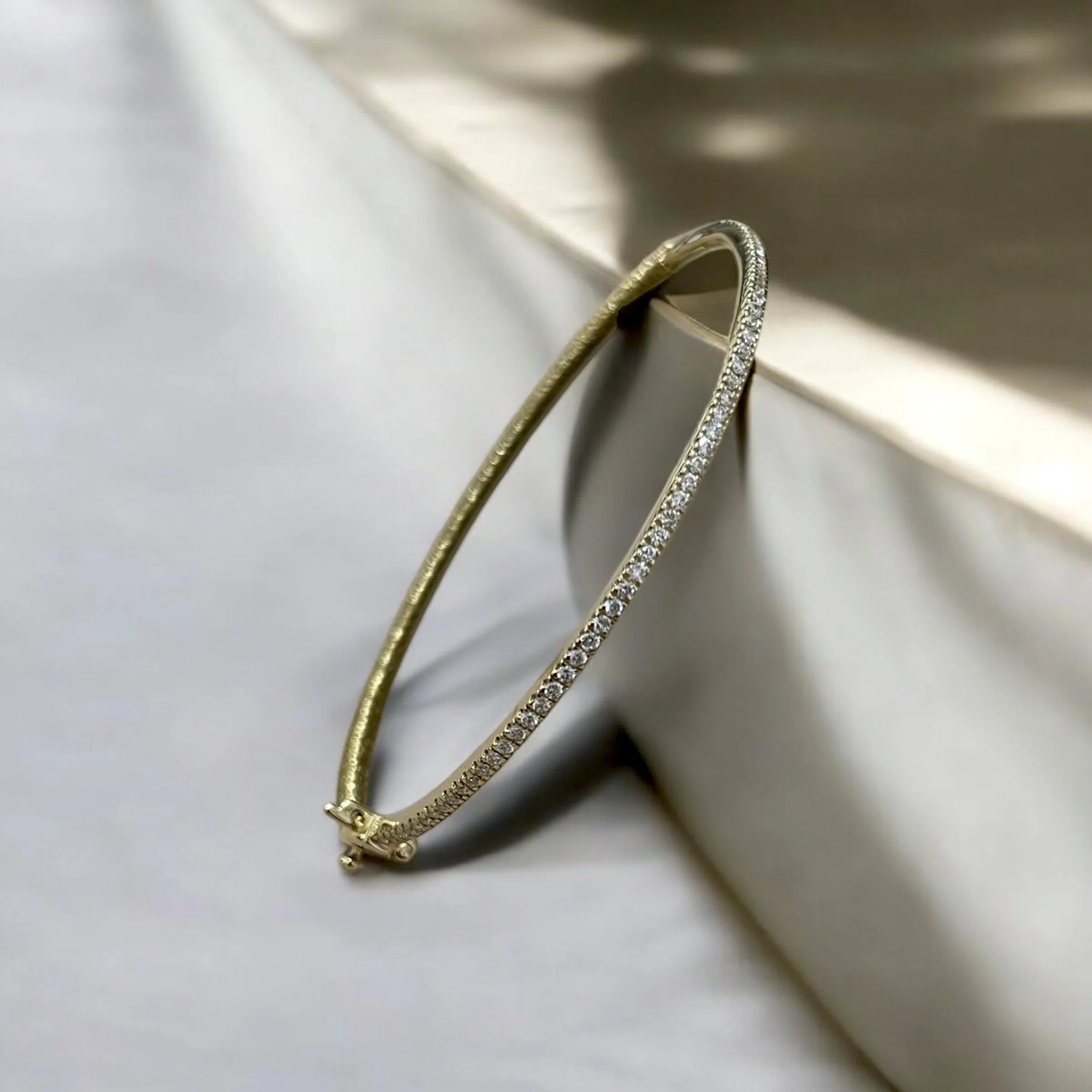 BPLS100 14KT YELLOW GOLD AND DIAMOND PAVÉ SEVEN INCH BRACELET HANDWOVEN WITH GOLD CORD .5CTW