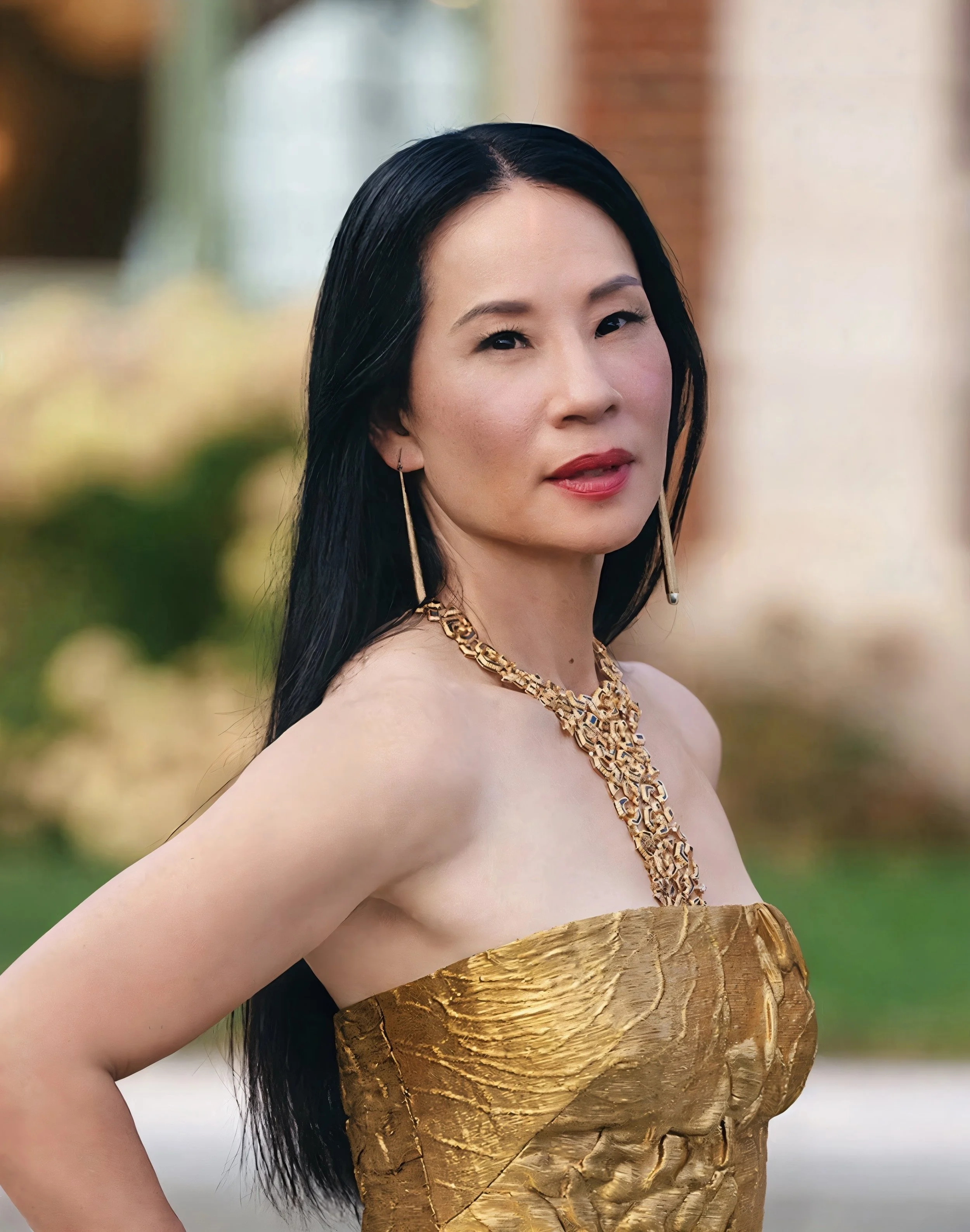 LUCY LIU DEVIL WEARS PRADA 2 SIMON ALCANTARA EARRINGS COVER.JPG
