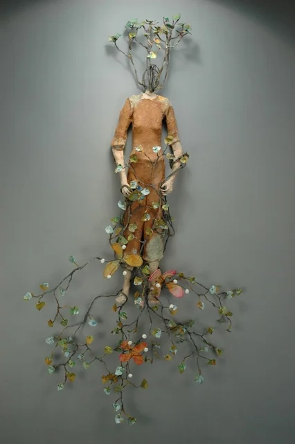 she weaves her world into cuffs, knees & sleeves