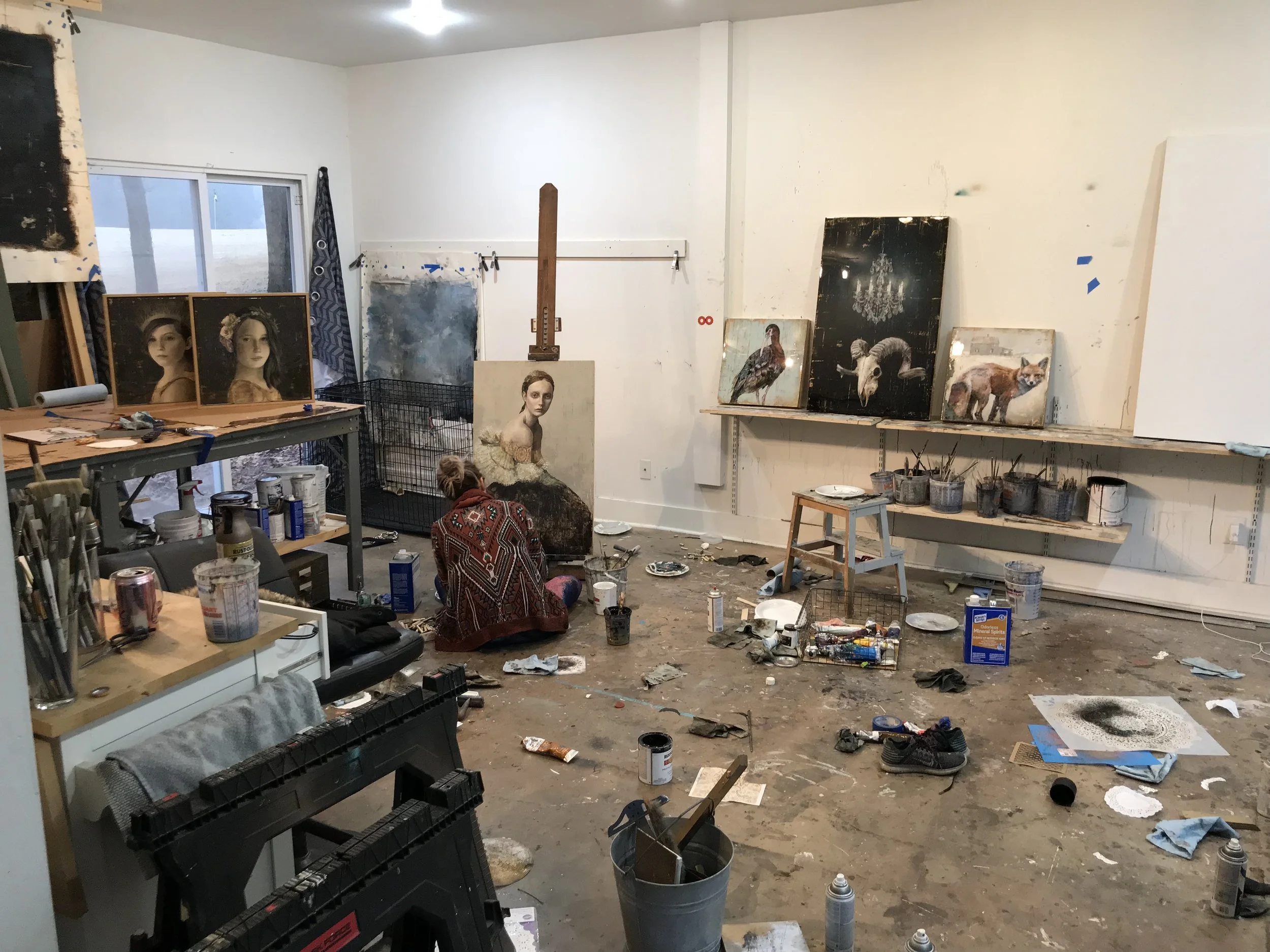 sarah helser working in her studio in charlotte