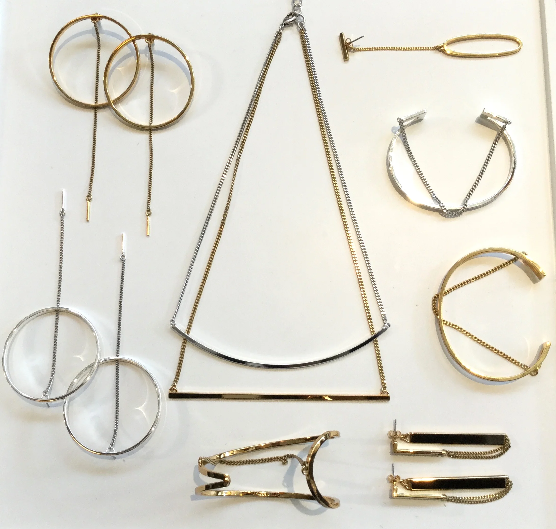 By now we all know it's ok to mix and match our metals, but there are few who do it as well as Jenny Bird. In her latest collection she plays with 14k gold, sterling silver and rose gold dipped brass to create her shiny new statement pieces. Rhine Hoops $75, Tula Swing $95, River Cuff $95, Ear Slant Cuff $70, Mia Cuff $85, Zenith Earrings $70