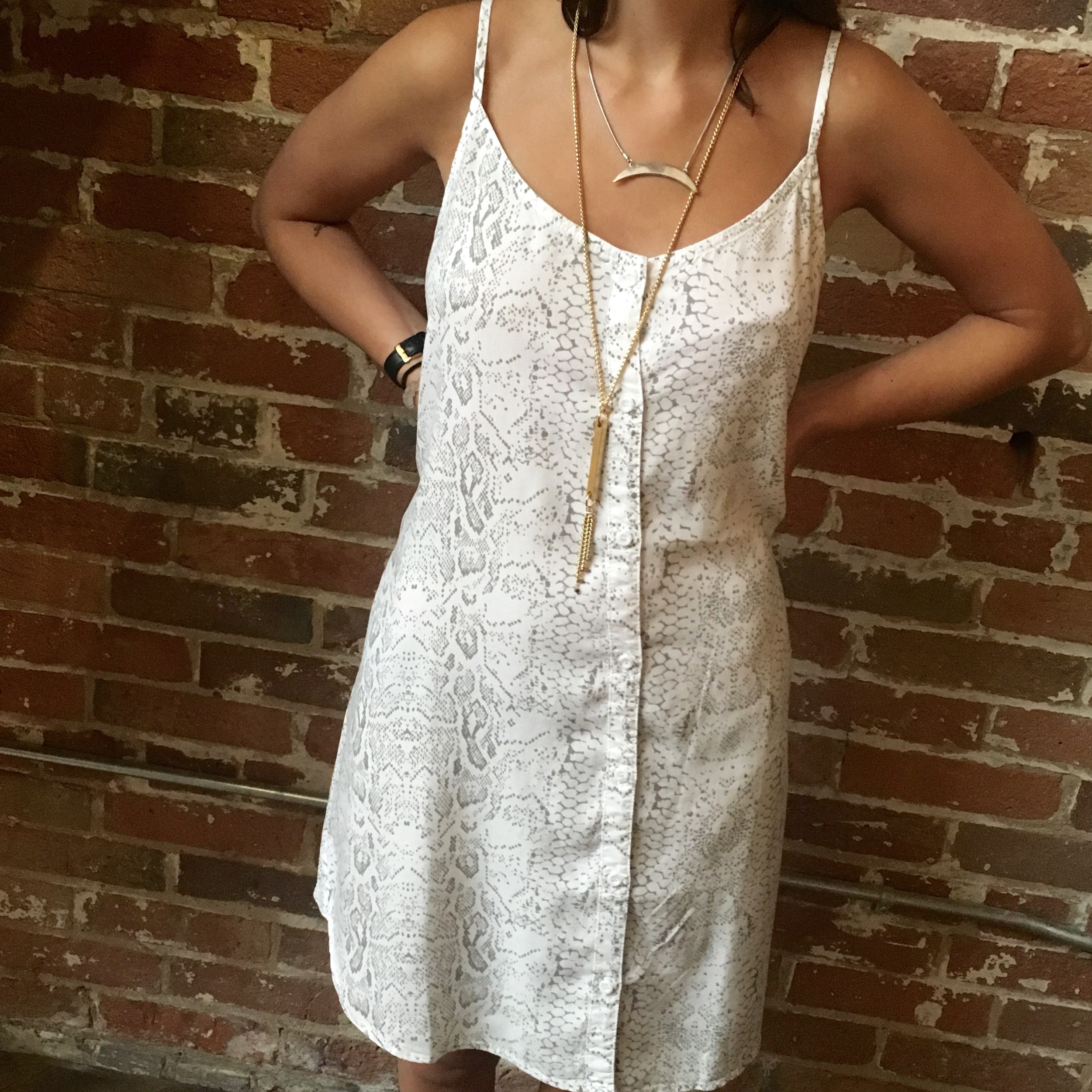 Bella Dahl Snakeskin Print Dress $190 Liel & Lentz Gold Bar Necklace $150 Jenny Bird Crescent Moon Necklace $70