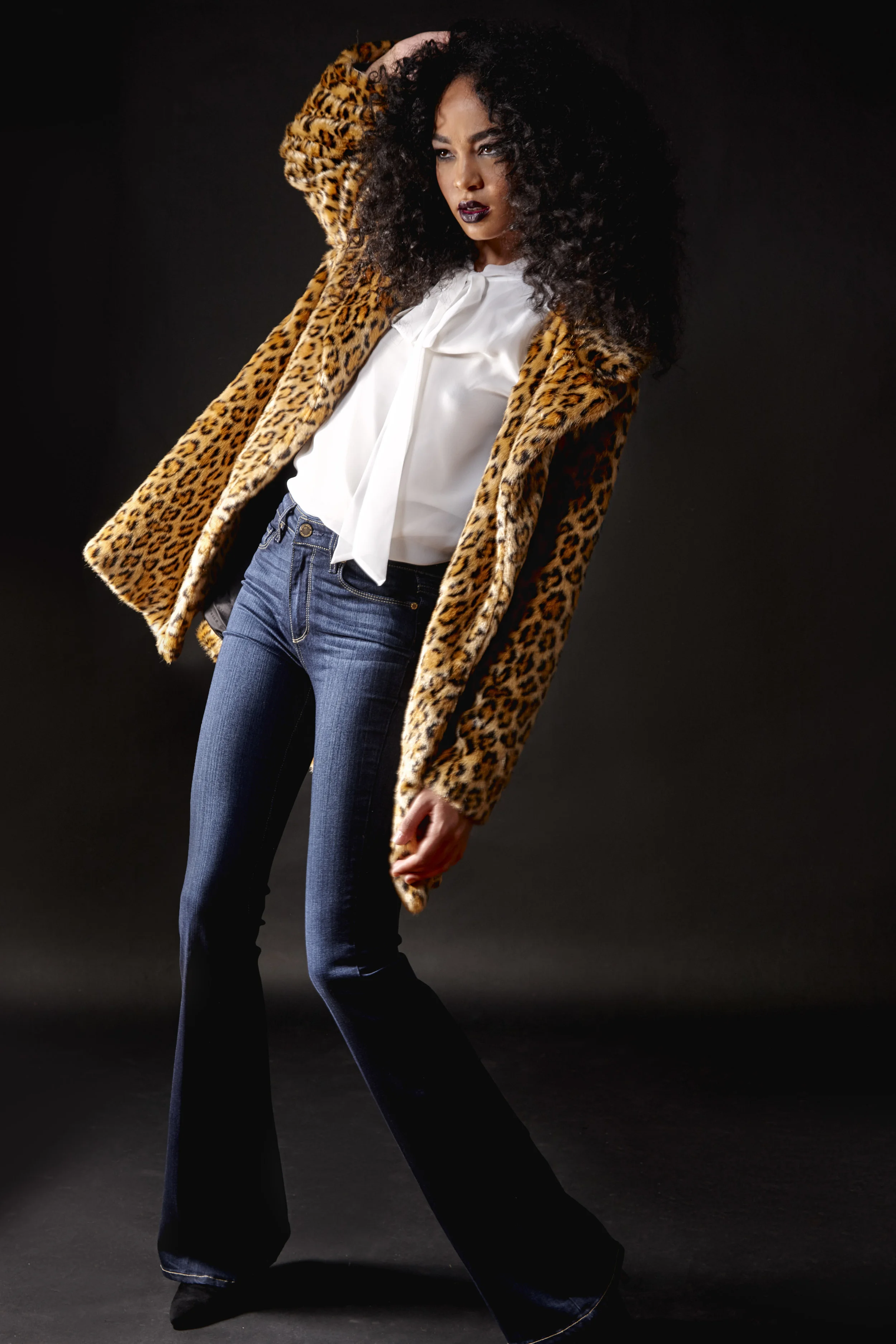 Don't be afraid of the flare! Wide leg pants are back and this Flare jean is a flattering silhouette. Dress them up with some volume on top like this bow blouse. Maison Scotch Leopard Coat $399 Paige Flare Denim $305 Likely Bow Blouse $235