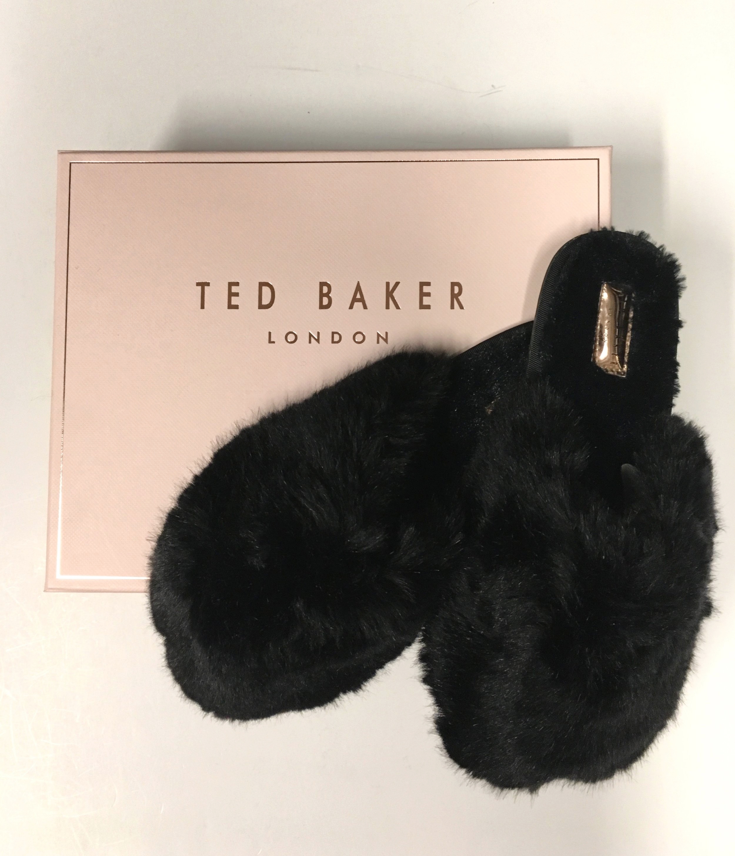 Ted Baker slippers come in the pink or the black. Can we wear these to work? $109
