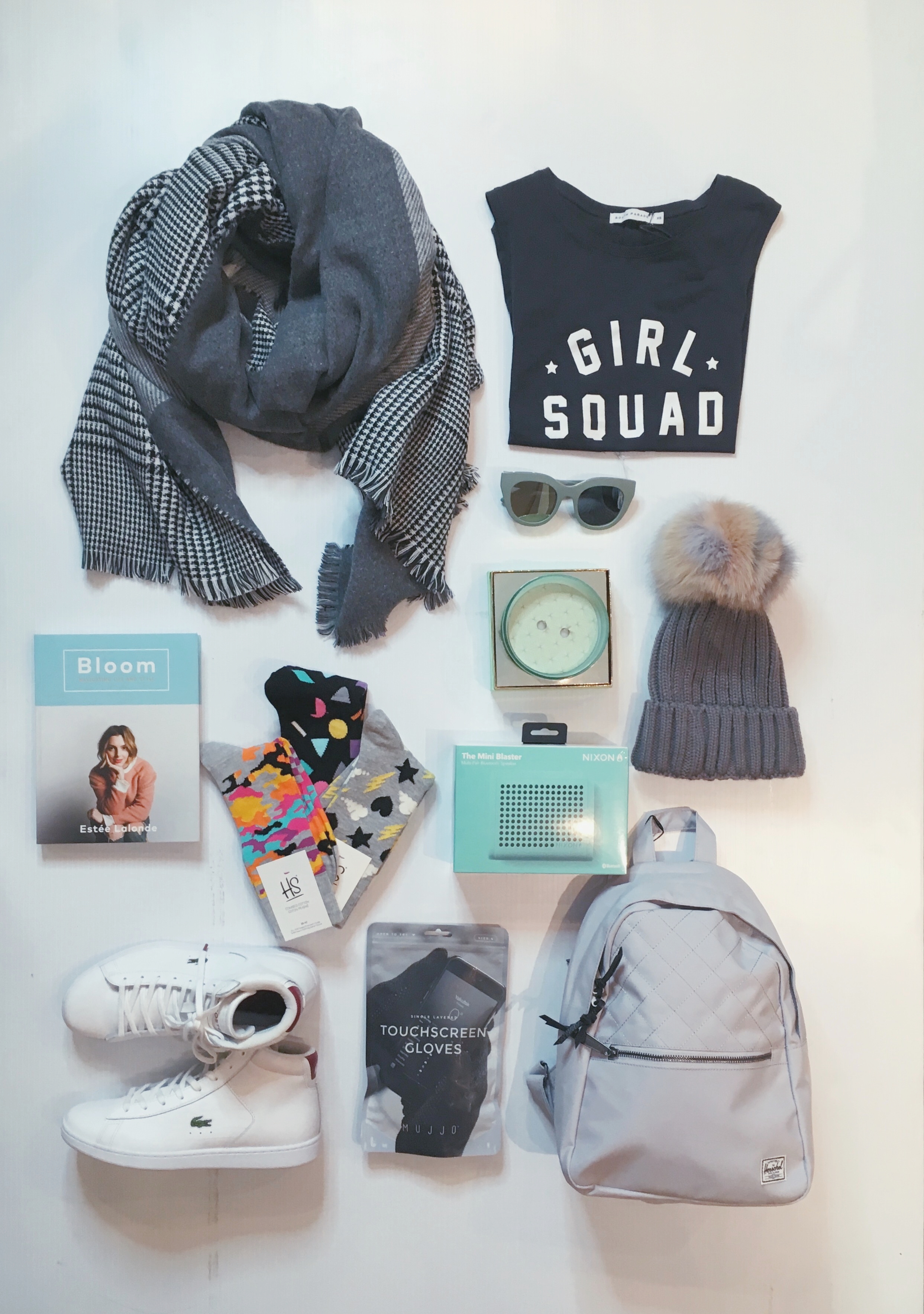 When they probably own everything but it's time for an upgrade... Featured: (left to right) Fraanklin Reversible Scarf $105 | Girl Squad Tee $66 | Le Specs $110 | Bloom Book by Estee Lalonde $28 | Happy Socks $15 | Nixon Mini Blaster $110 | Odeme Candle $69 | Multicoloured Fur Pom Toque $125 | Lacoste Carnaby Sneakers $195| Mujjo Tech Gloves $49 | Herschel Town Backpack $64