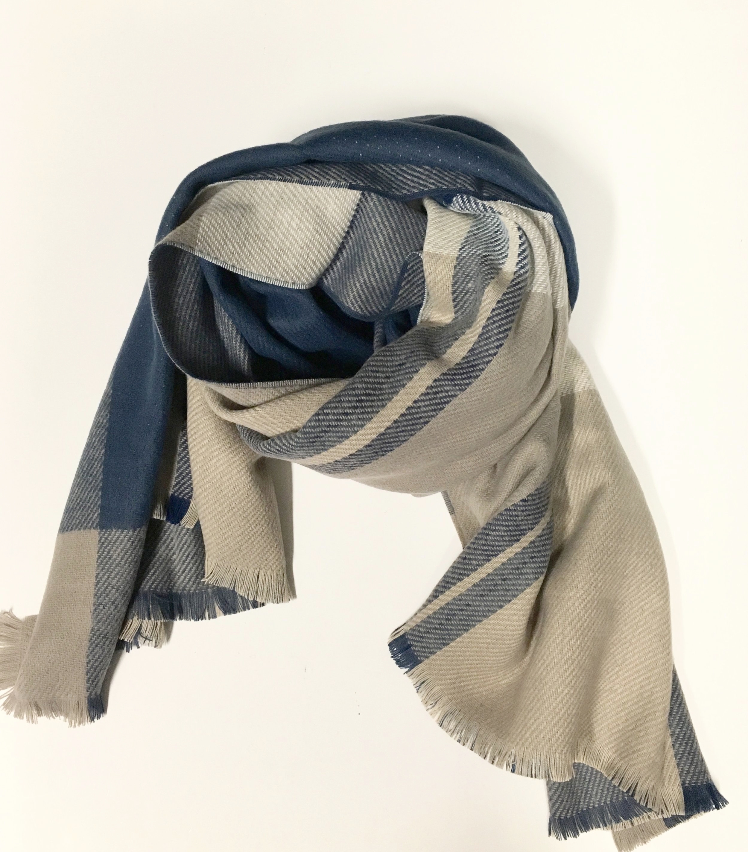 Fraanklin Scarves come in a few styles, and each scarf is reversible! Trust us, you need this in your life - er your secret santa does. $105