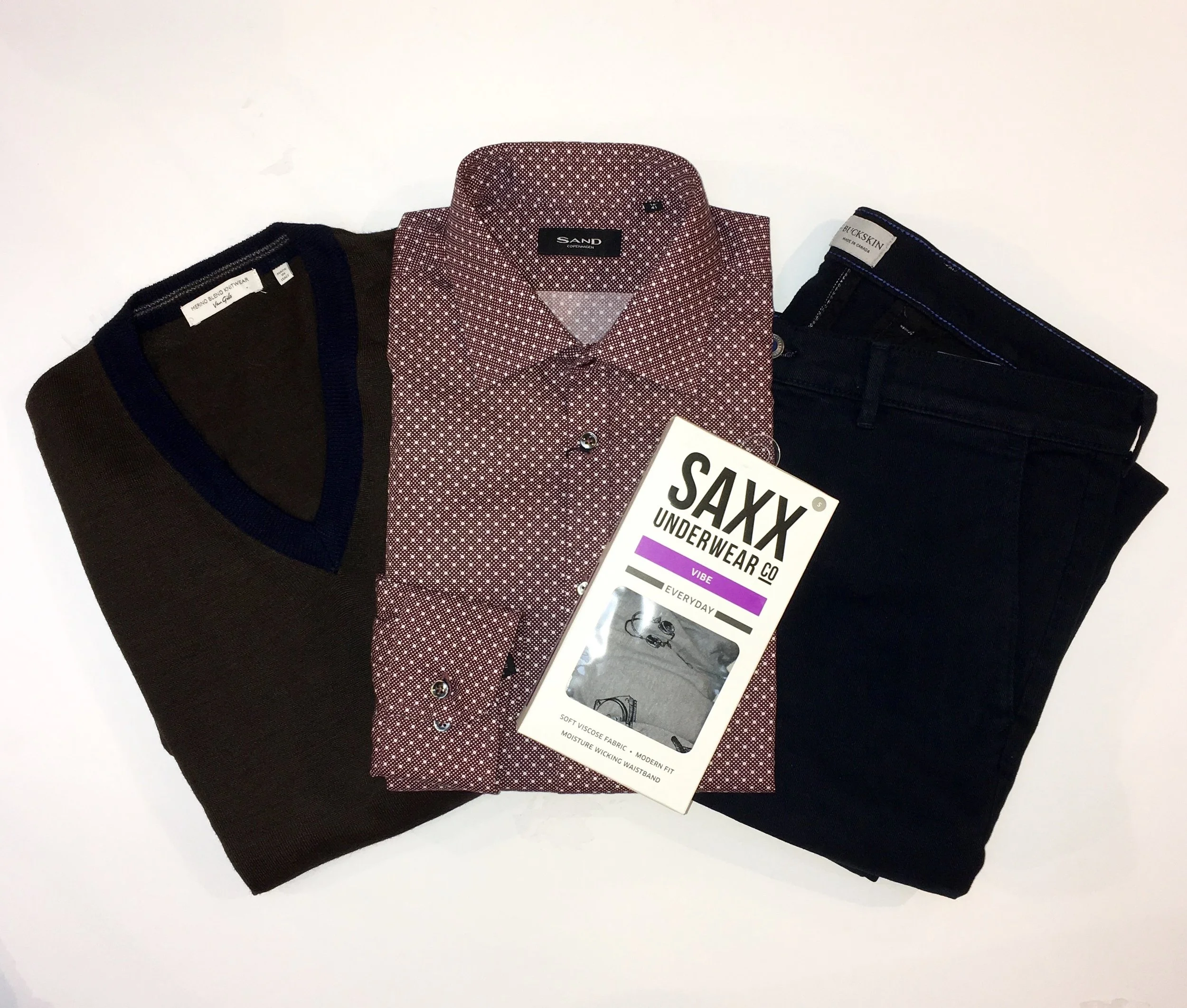 Business Man Starter Pack: Van Gils Merino Wool Sweater $145 Sand Dress Shirt $225 Buckson Slacks $220 Saxx Underwear $32 - If he still hasn't tried these, this is your number one gift idea.