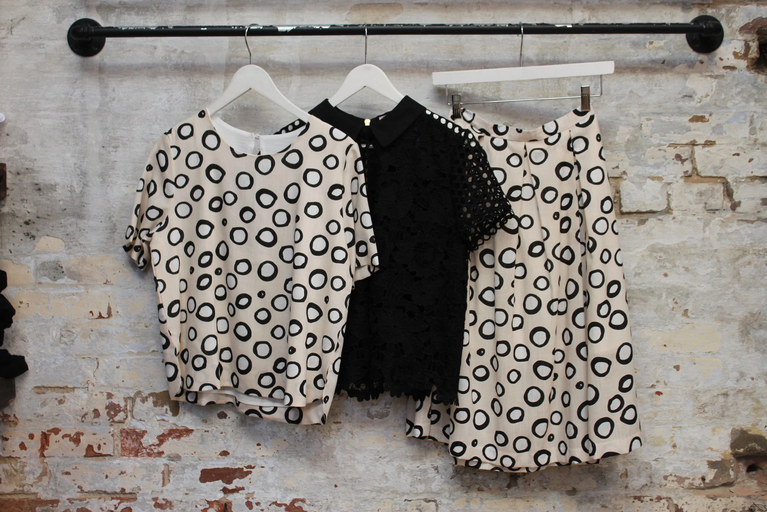 Suncoo Top Was $150/ Now $105 Ted Baker Lace Top $285/ Now $129 Suncoo Midi Skirt Was $185/ Now $135