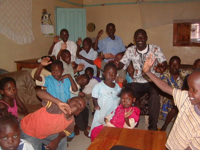 pastor_thomas_okinyi_the_orphan_kids_in_the_orphanage_home_siiting_room.JPG