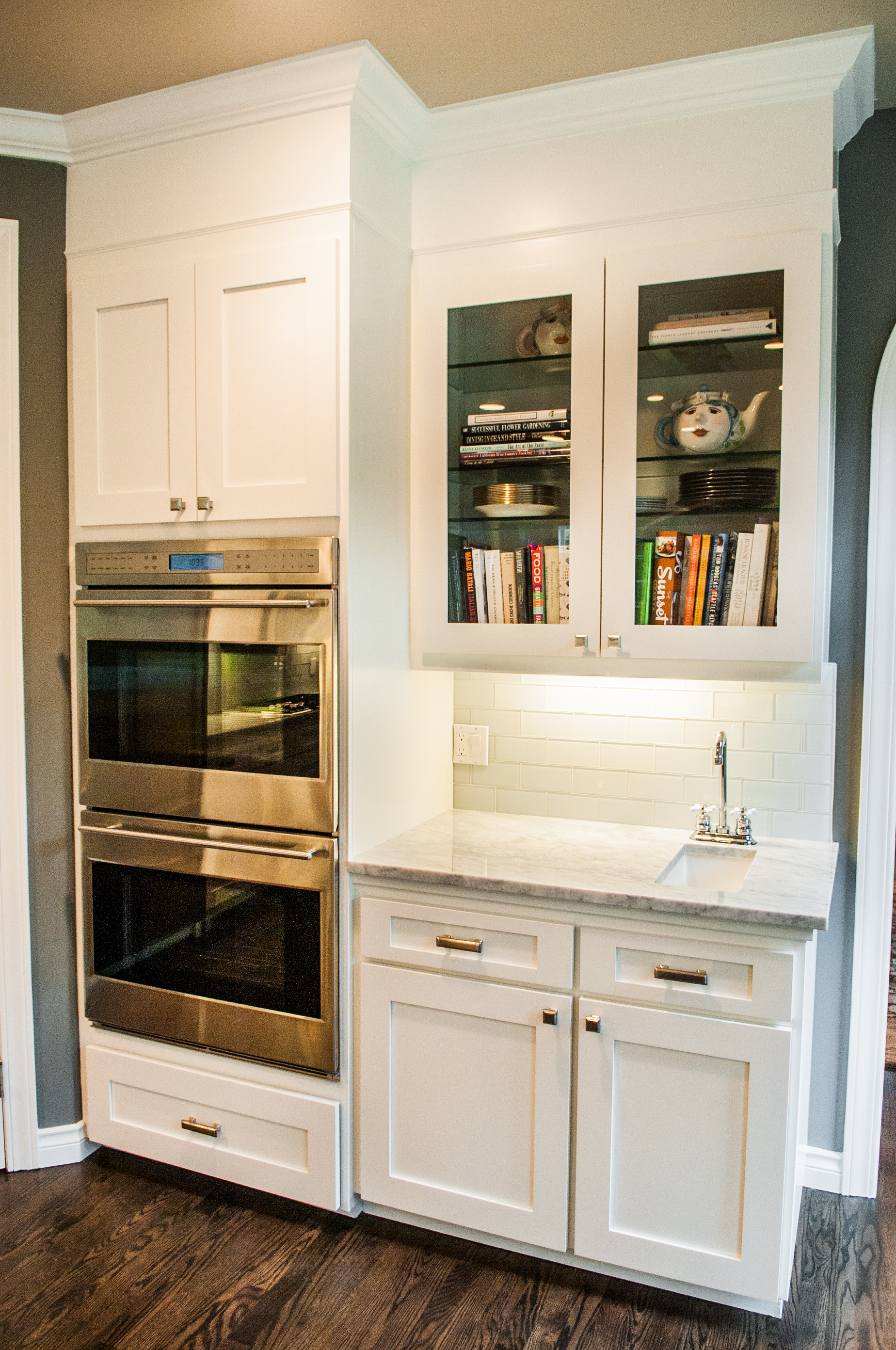 We added a small secondary bar sink and updated the twin ovens. 