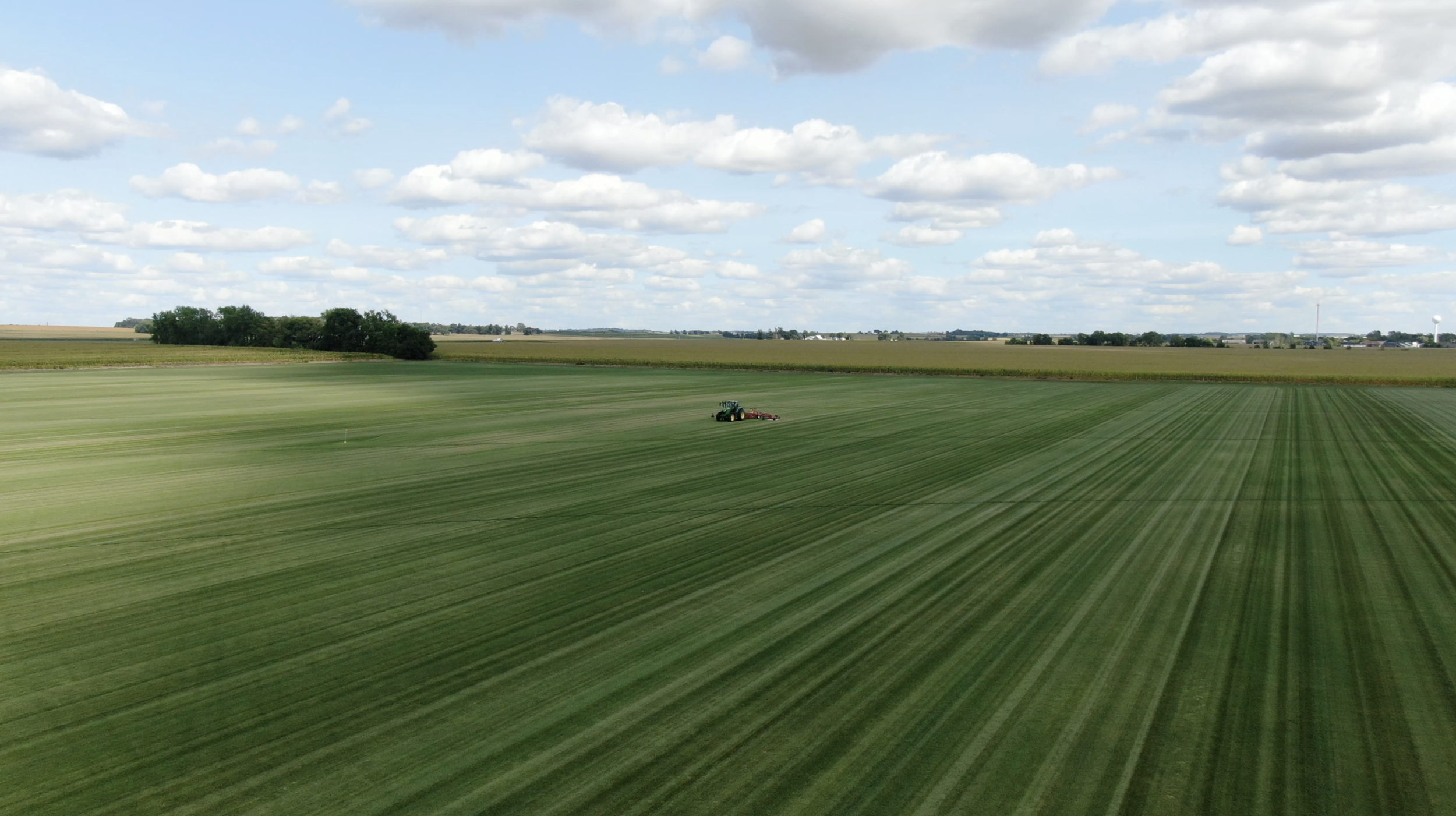 Mowing the sod field at Blue Grass